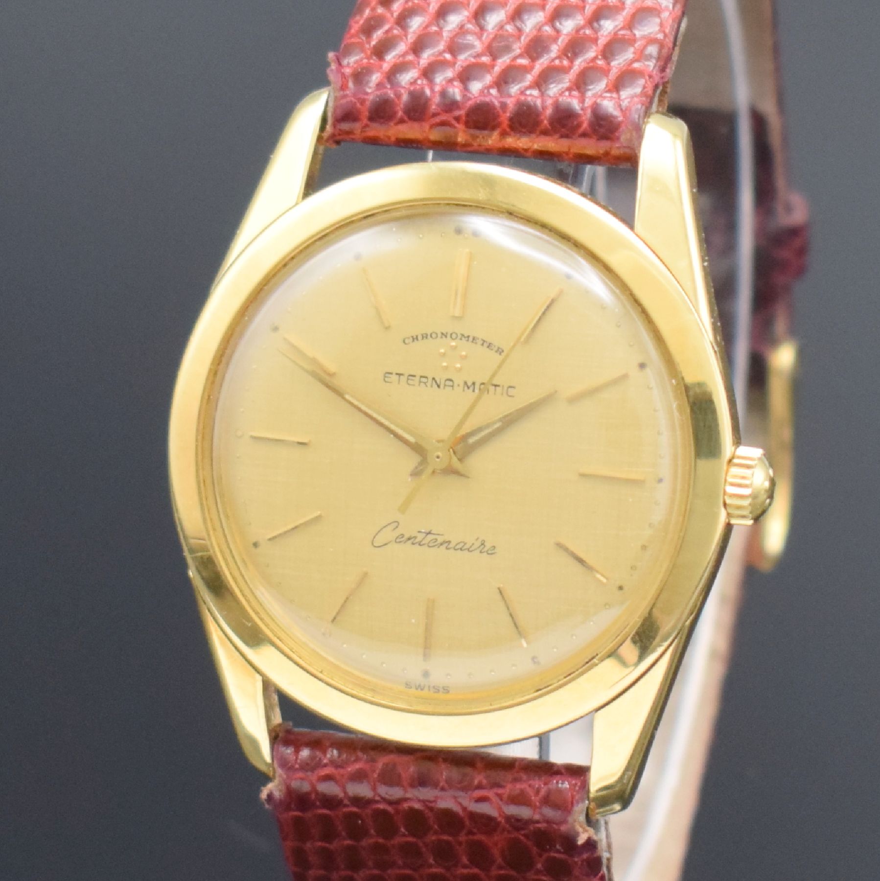 Detail c: ETERNA-MATIC Centenaire Chronometer Herrenarmbanduhr in GG 750/000, Schweiz um 1965, Automatik, 3-teil. Geh., Boden geschr., Glasrand aufgedr., gold. ...
