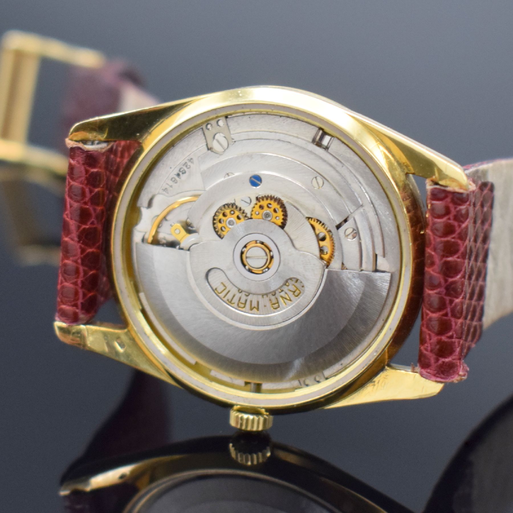 Detail g: ETERNA-MATIC Centenaire Chronometer Herrenarmbanduhr in GG 750/000, Schweiz um 1965, Automatik, 3-teil. Geh., Boden geschr., Glasrand aufgedr., gold. ...