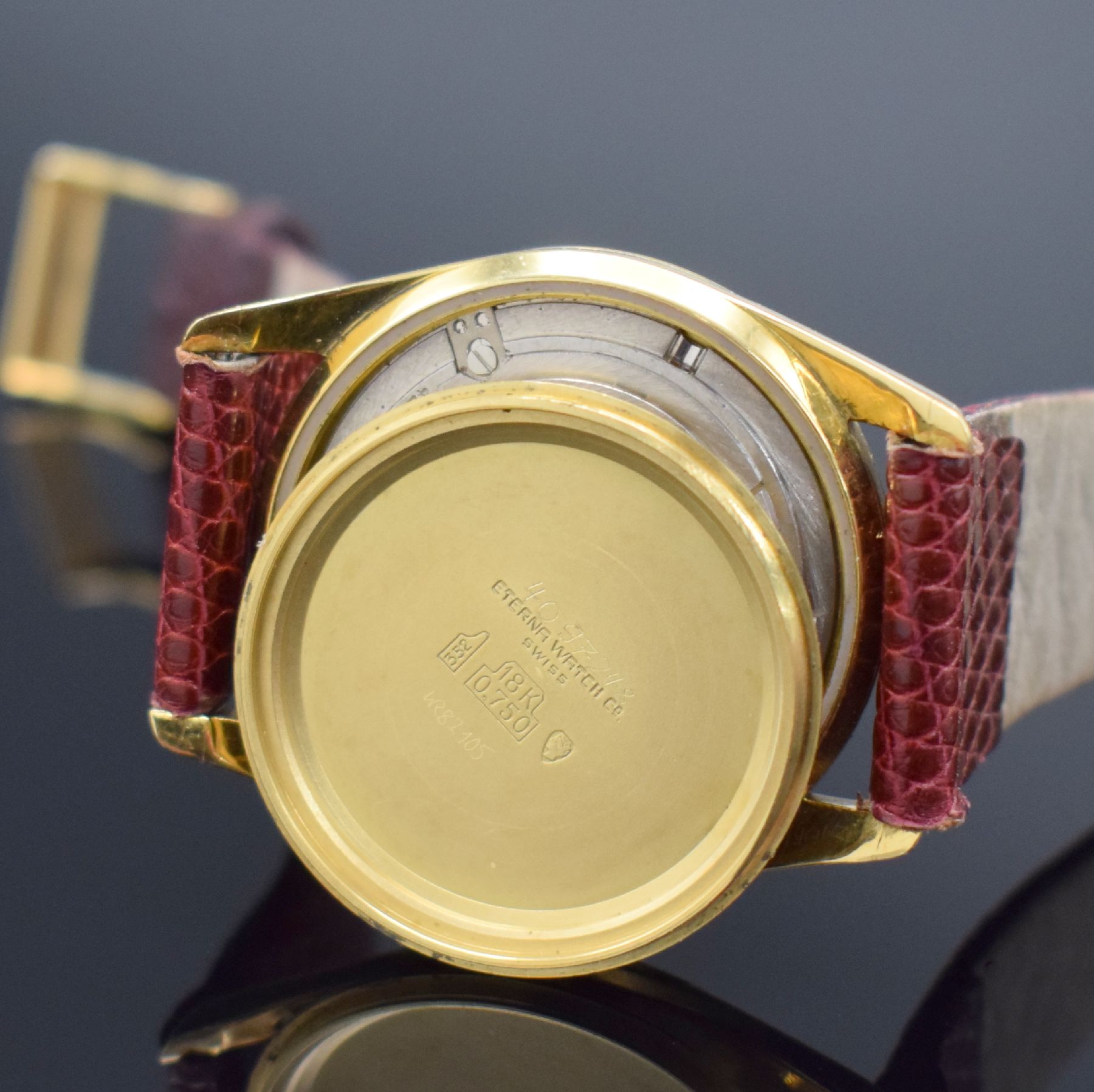 Detail h: ETERNA-MATIC Centenaire Chronometer Herrenarmbanduhr in GG 750/000, Schweiz um 1965, Automatik, 3-teil. Geh., Boden geschr., Glasrand aufgedr., gold. ...
