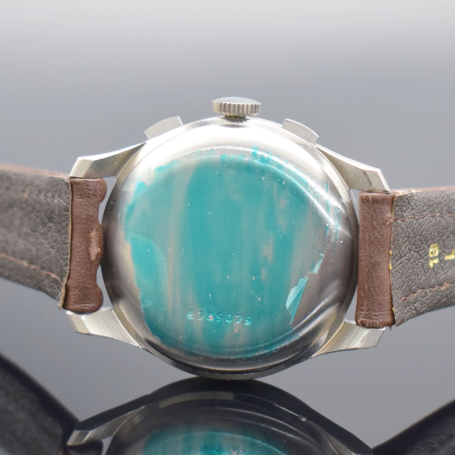 Detail d: DOXA nahezu neuwertige Herrenarmbanduhr mit Schaltradchronograph in Stahl, Schweiz um 1950, Handaufzug, gedr. 3-tlg. Geh. noch mit Schutzlack auf dem ...