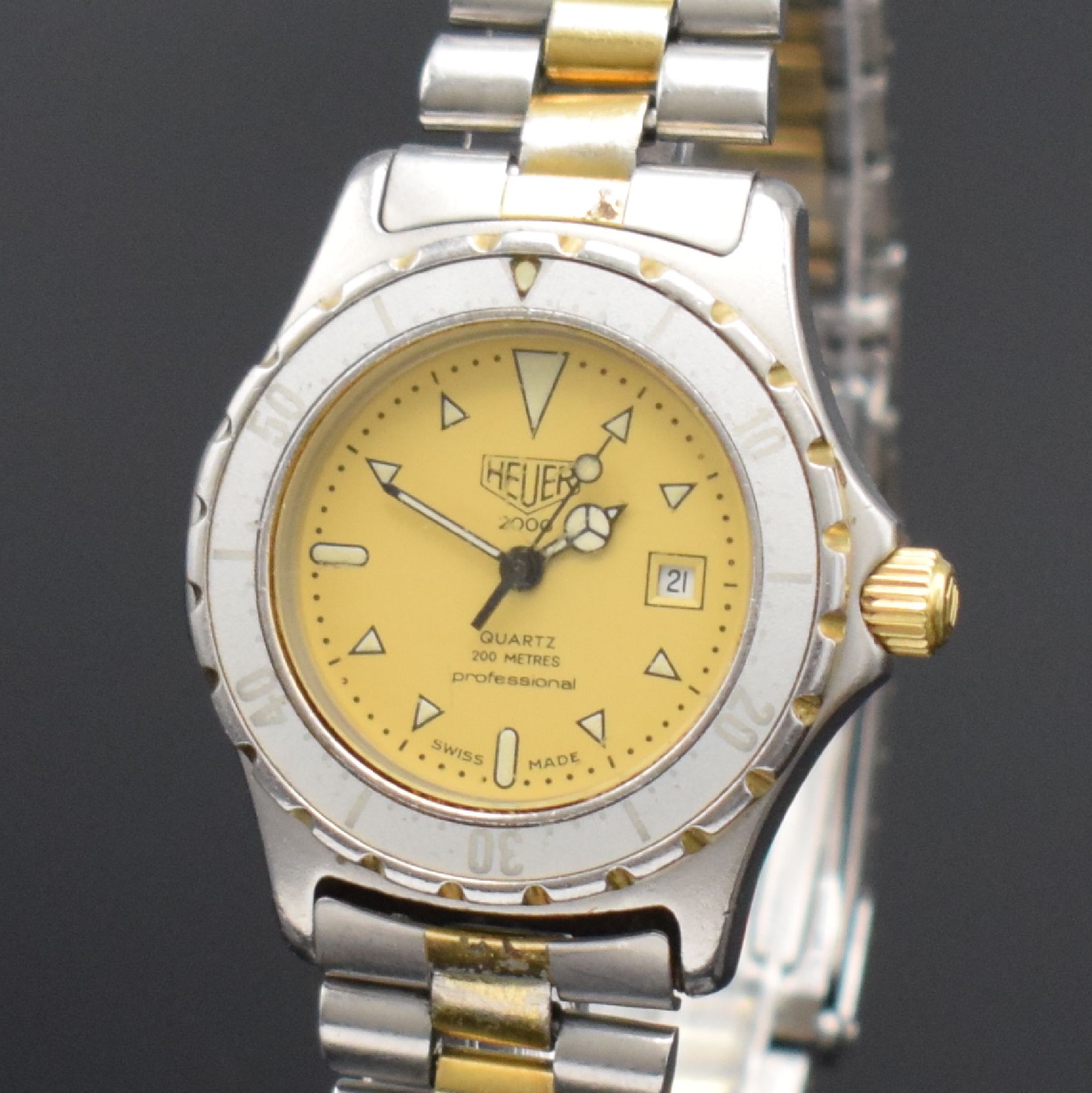 Detail c: TAG HEUER Damenarmbanduhr Professional Referenz 974.015, Schweiz um 1980, Edelstahlgeh. inkl. Gliederband m. Faltschl. z. T. verg., Boden & Krone ...