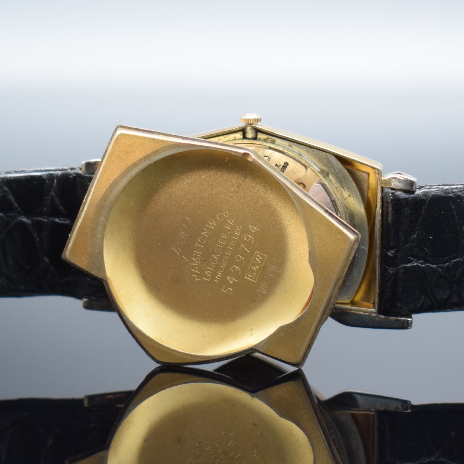 Detail f: HAMILTON Electric Modell Pacer seltene vergoldete Armbanduhr, USA um 1959, eine der ersten elektromechanischen Uhren, asymetrisches Geh. teils ...