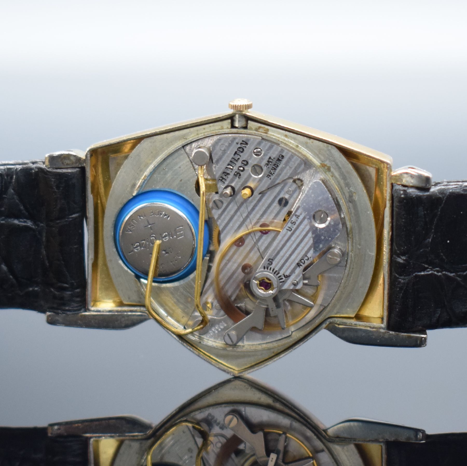 Detail g: HAMILTON Electric Modell Pacer seltene vergoldete Armbanduhr, USA um 1959, eine der ersten elektromechanischen Uhren, asymetrisches Geh. teils ...