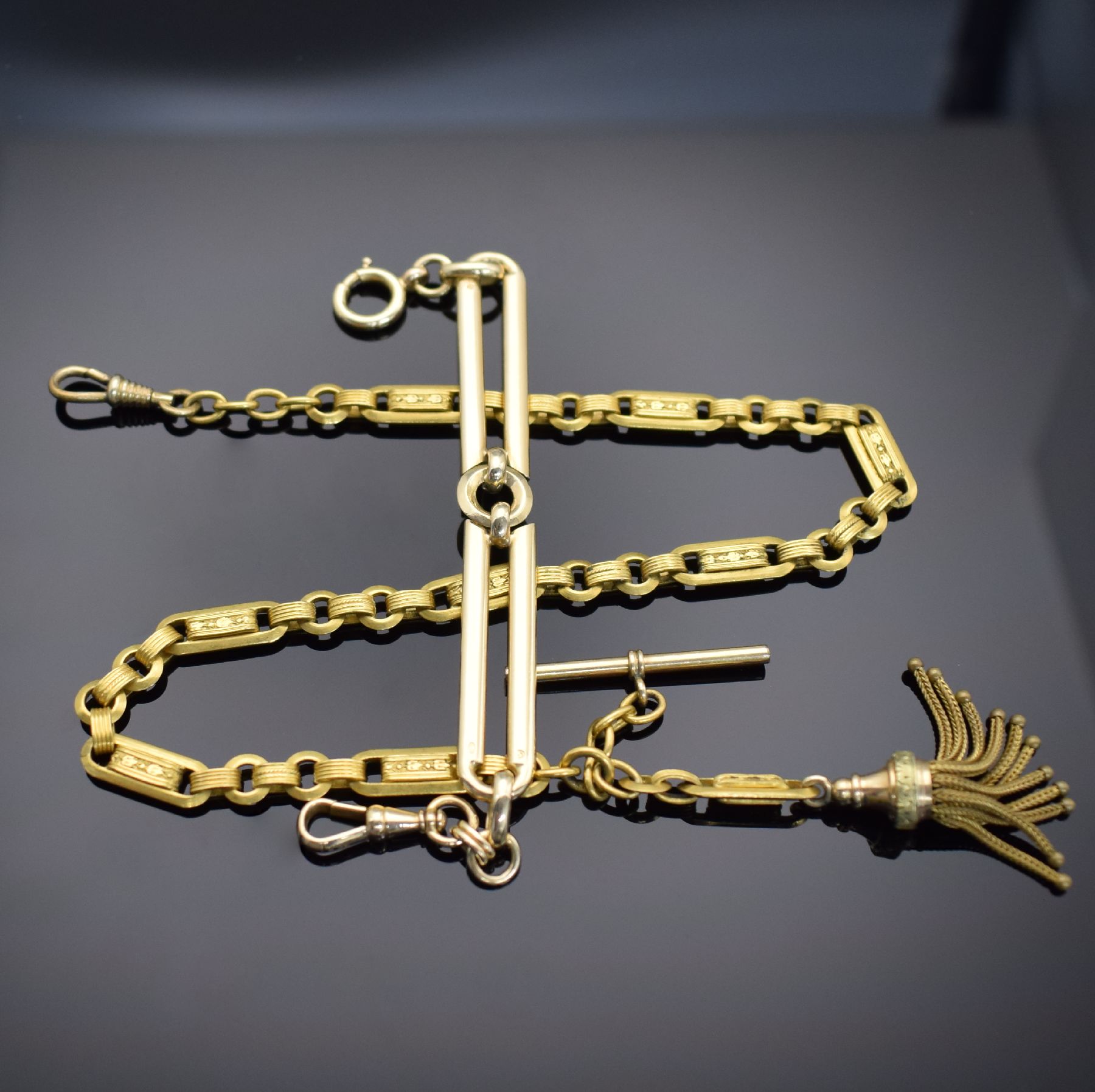 Taschenuhr-Chatelaine in GG 585/000 & vergoldeter Taschenuhrkette, um 1900, Chatelaine L. ca. 14 cm, m. Karabiner & Federring, Gew. ca. 19g, verg. ...