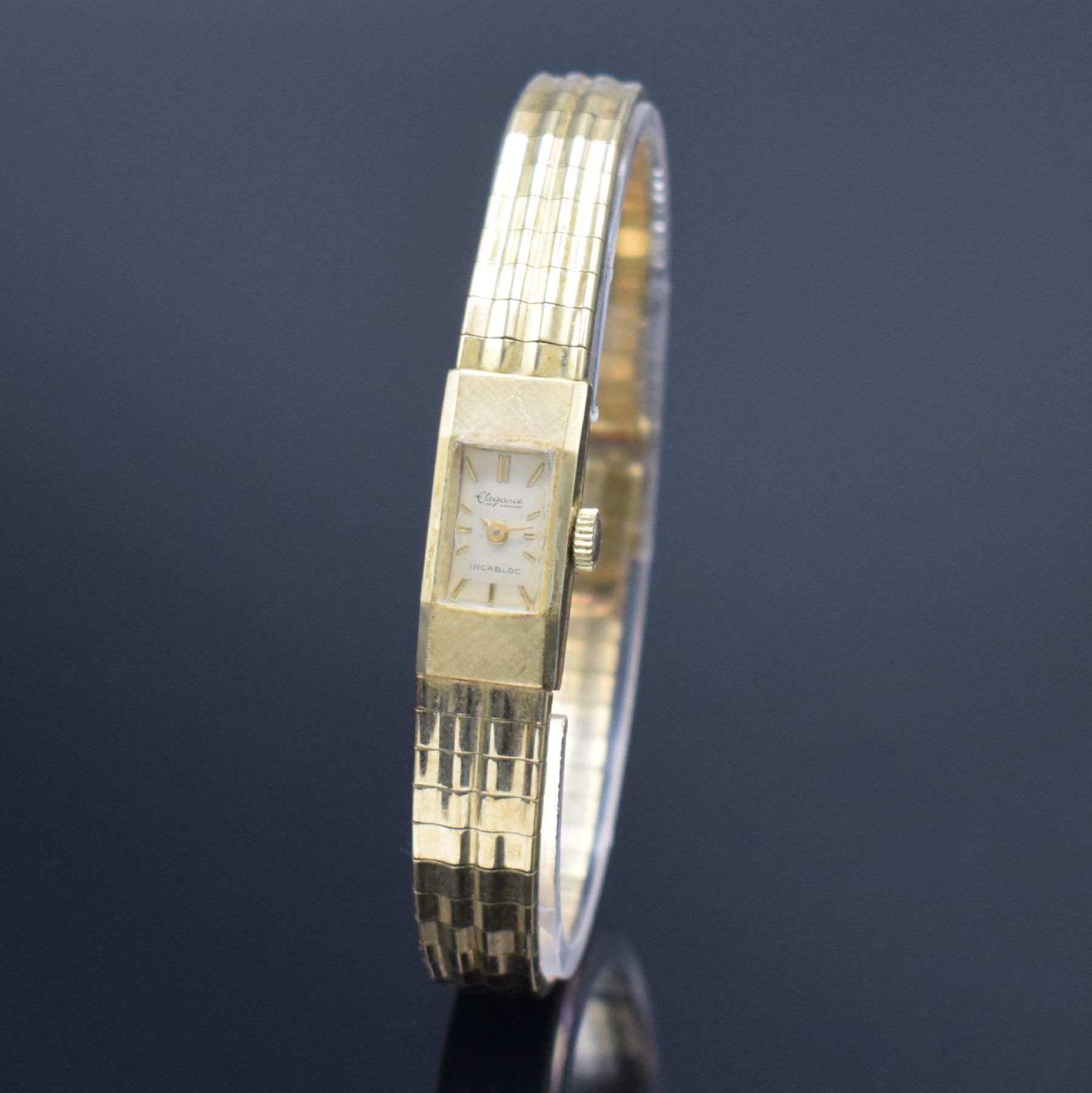 Detail b: ELEGANCE Damenarmbanduhr in GG 585/000 mit Goldband in 585/000, Schweiz um 1960, Handaufzug, 2-teil. Geh., Boden aufgedr., Goldband m. Klappschl., ...
