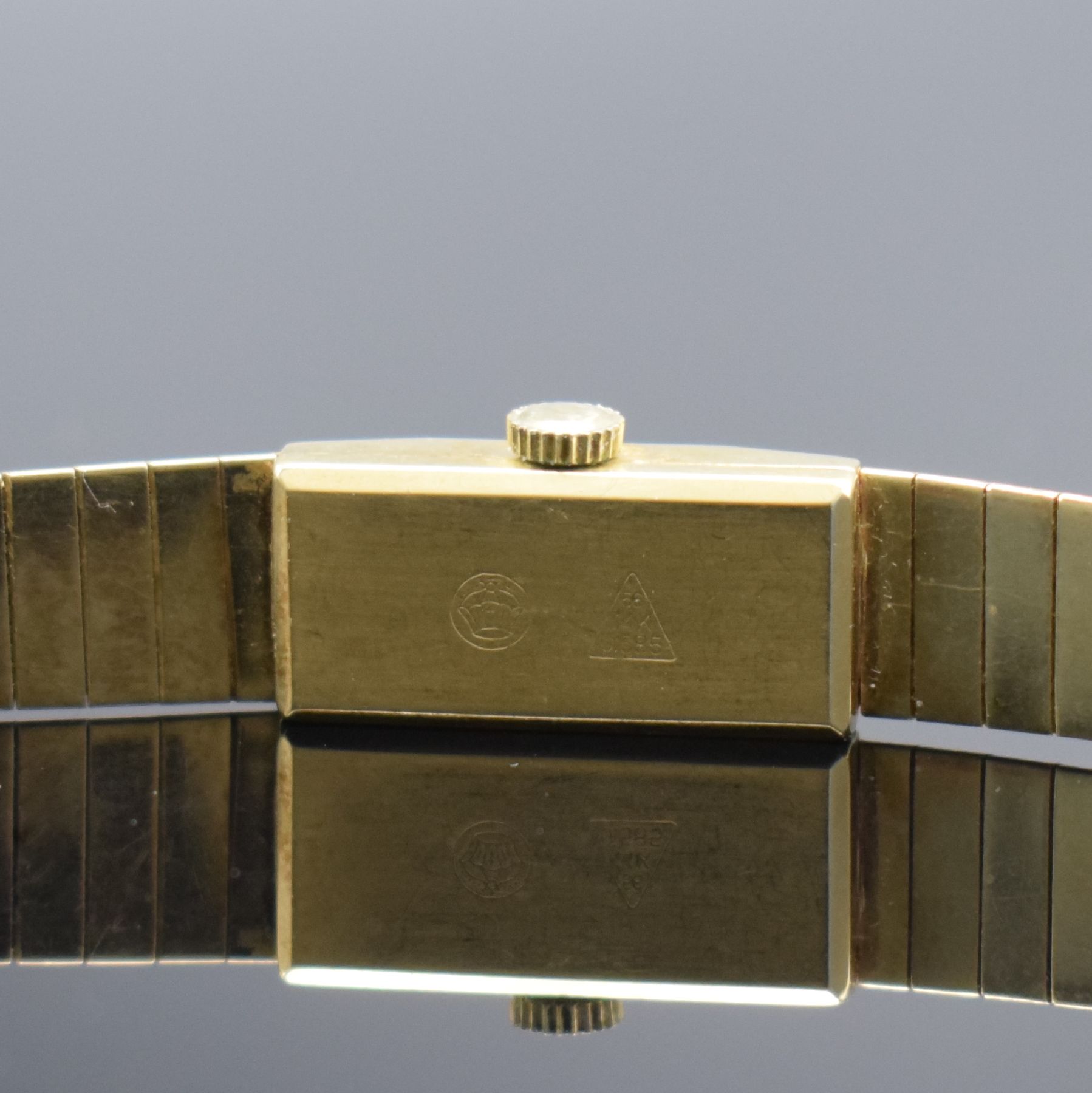 Detail e: ELEGANCE Damenarmbanduhr in GG 585/000 mit Goldband in 585/000, Schweiz um 1960, Handaufzug, 2-teil. Geh., Boden aufgedr., Goldband m. Klappschl., ...