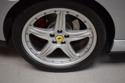 26370315h - Ferrari 575 F1 Maranello, first registered 01/2005, chassis number: ZFFBT55B000134687, mileage approximately 41.000 km, regularly serviced, 379 kW/515 PS, automatic transmission, exterior color silver metallic, interior full leather in Bordeaux, Daytona seats, complete onboard toolkit/original toolbox, 2 new tanks installed