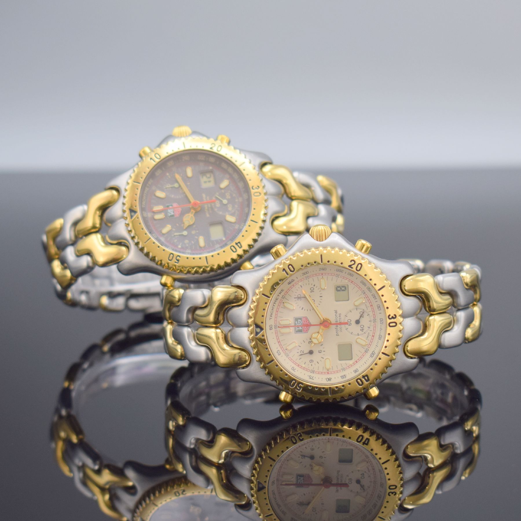 TAG HEUER 2 Armbandchronographen Serie Professional Referenz CG1122-0 und CG1123-0, Schweiz um 2000, quarz, Edelstahlgeh. inkl. Gliederbänder m. ...