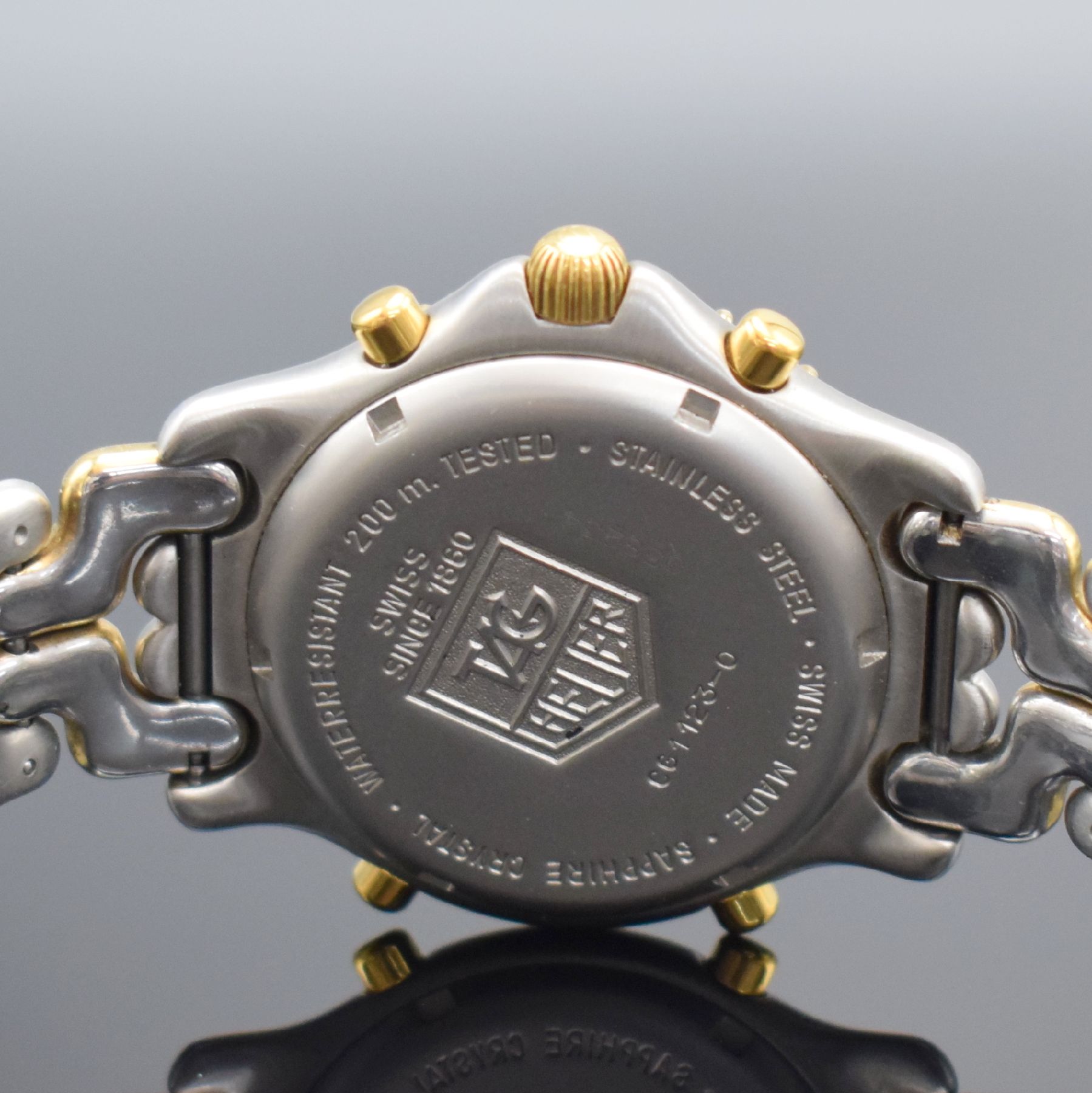 Detail d: TAG HEUER 2 Armbandchronographen Serie Professional Referenz CG1122-0 und CG1123-0, Schweiz um 2000, quarz, Edelstahlgeh. inkl. Gliederbänder m. ...