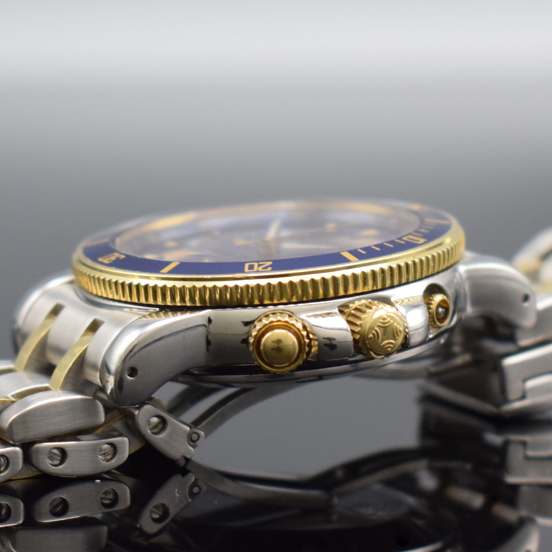 Detail e: ZENITH El Primero Rainbow Herrenarmbanduhr mit Chronograph in Stahl/Gold, Schweiz verk. lt. beil. Garantiekarte 08/2001, Automatik, Ref. ...