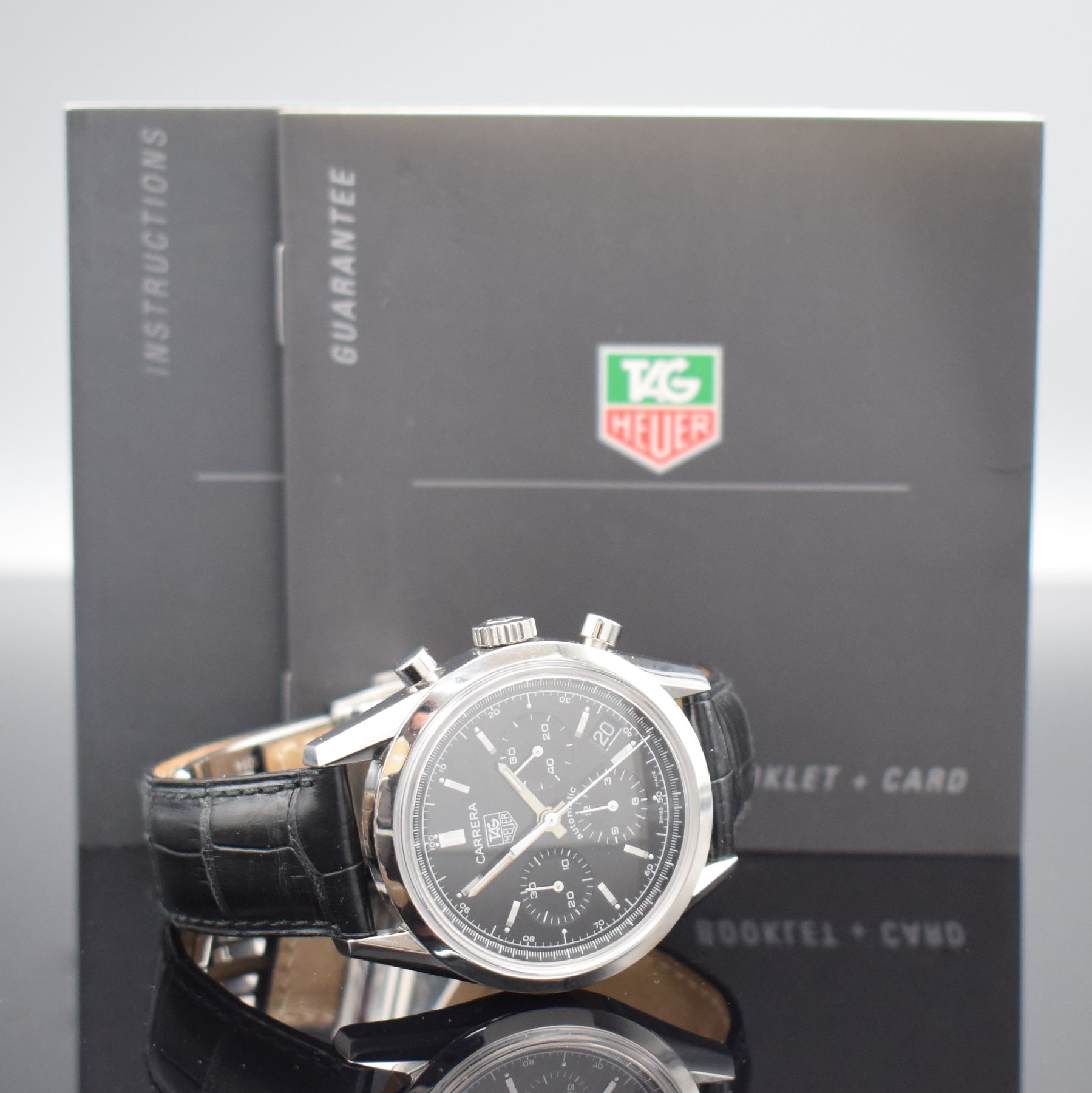 Detail e: TAG HEUER Armbandchronograph Carrera Referenz CV2111-0, Automatik, Edelstahlgeh. inkl. orig. Lederband m. orig. Faltschl., Boden verschr., schwarzes ...