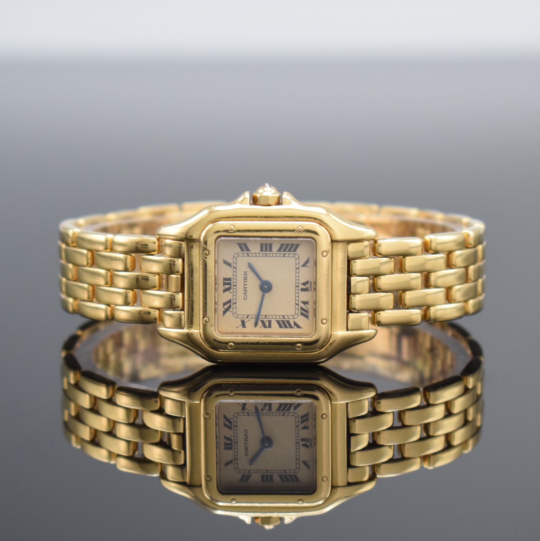 CARTIER Damenarmbanduhr Panthére in GG 750/000, Schweiz um 1985, massiv. Goldgeh. inkl. Gliederband mit dopp. Faltschl., Boden 8-fach verschr., ...