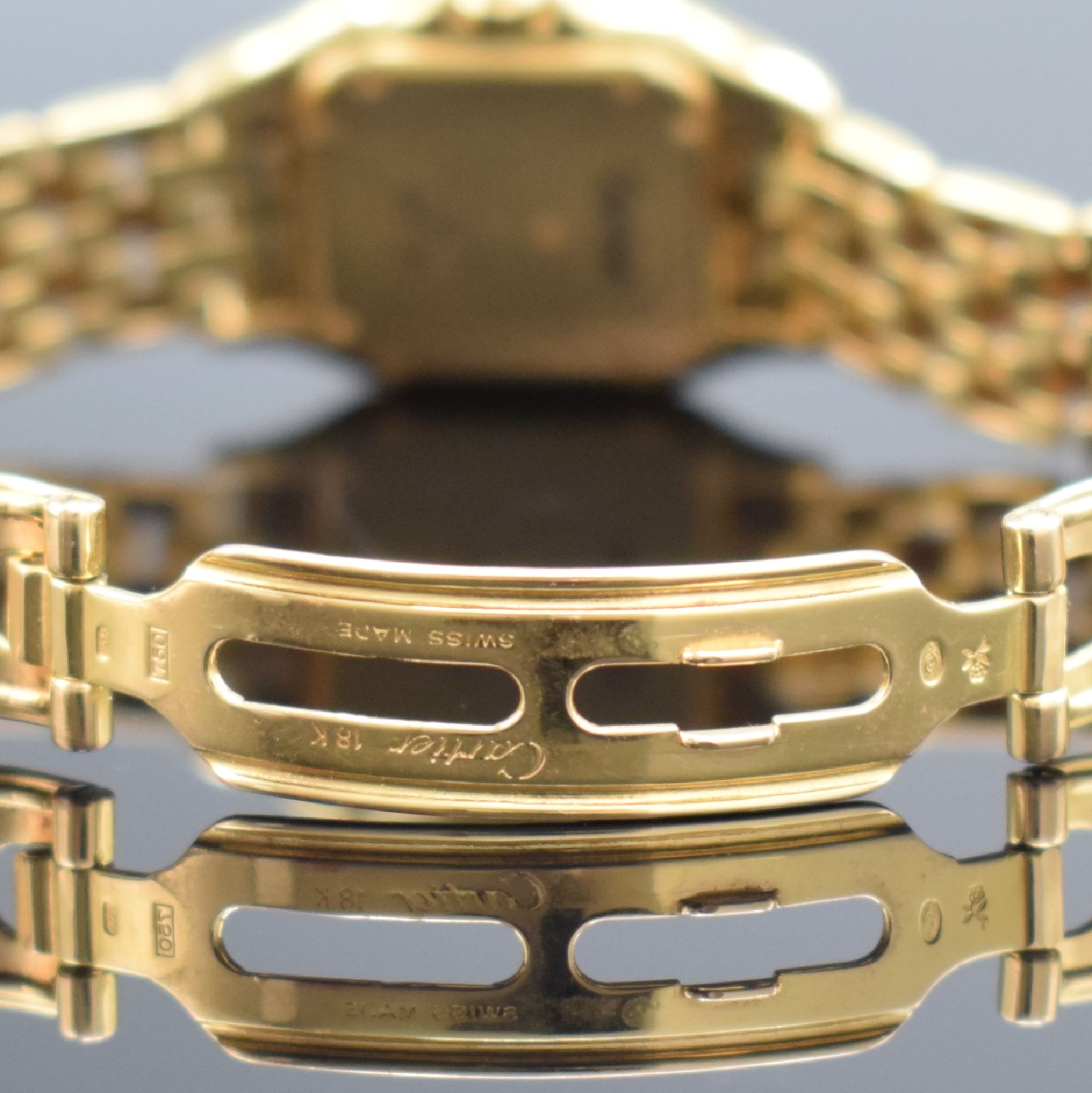 Detail d: CARTIER Damenarmbanduhr Panthére in GG 750/000, Schweiz um 1985, massiv. Goldgeh. inkl. Gliederband mit dopp. Faltschl., Boden 8-fach verschr., ...