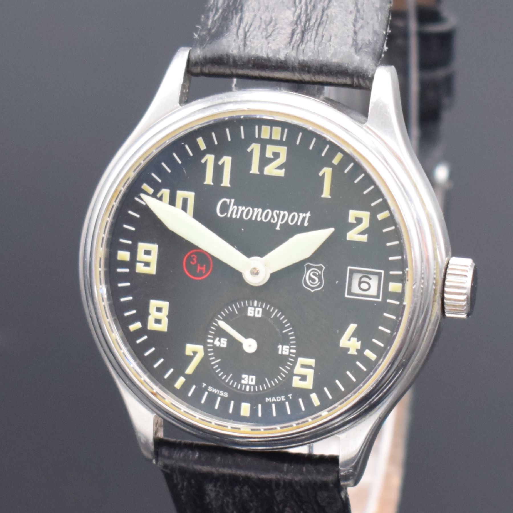 Detail c: SINN CHRONOSPORT Armbanduhr im Fliegeruhr- Design, Schweiz um 2003, Handaufzug, beids. vergl. Geh., Boden verschr., schwarz. Tritiumzifferbl., arab. ...
