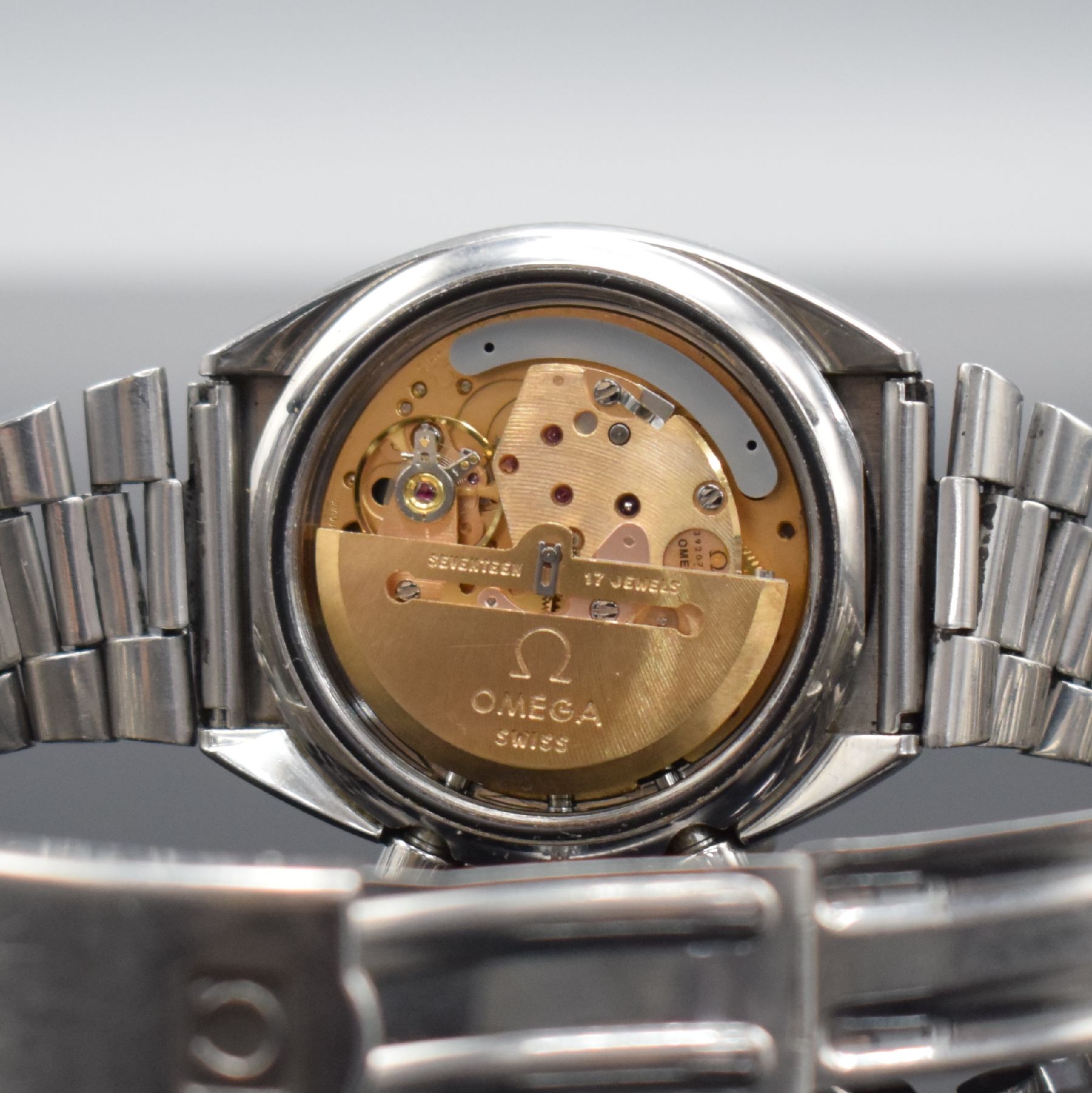 Detail g: OMEGA Speedmaster Armbandchronograph in Stahl, Schweiz um 1976, verschr. Geh. Ref. 176.0012, orig. Stahlband Ref. 1162/1/172 m. starken ...