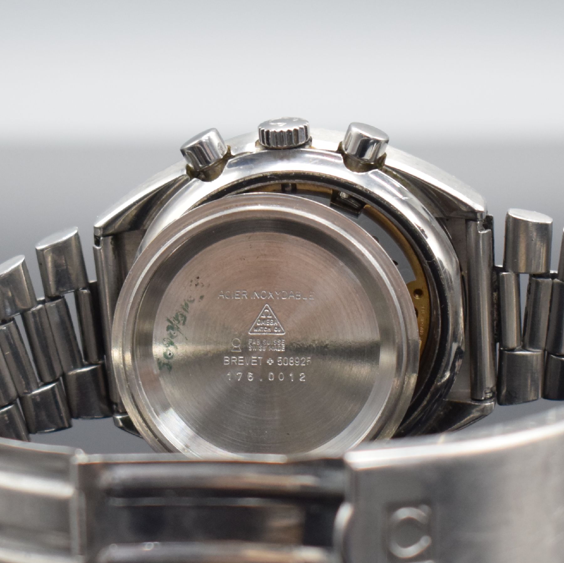 Detail h: OMEGA Speedmaster Armbandchronograph in Stahl, Schweiz um 1976, verschr. Geh. Ref. 176.0012, orig. Stahlband Ref. 1162/1/172 m. starken ...