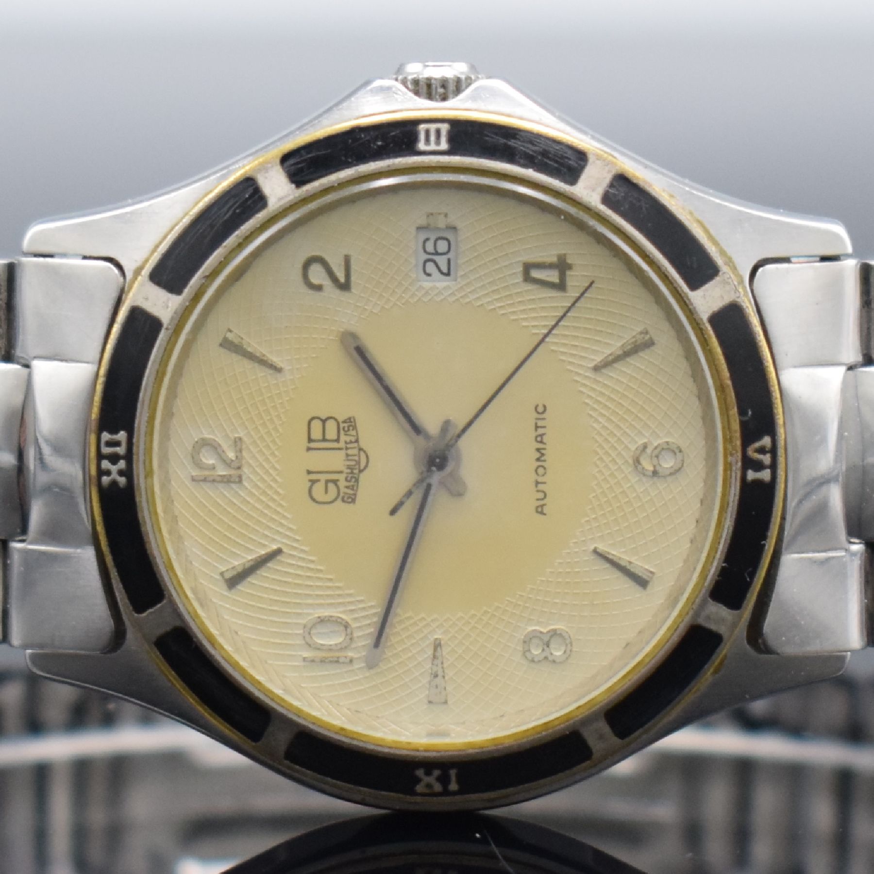 Detail a: GUB Automatik Herrenarmbanduhr, eine der ersten Serien nach der Wende mit Basiskal. ETA 2824-2, Edelstahlgeh., beids. vergl., Boden &Glasrand ...