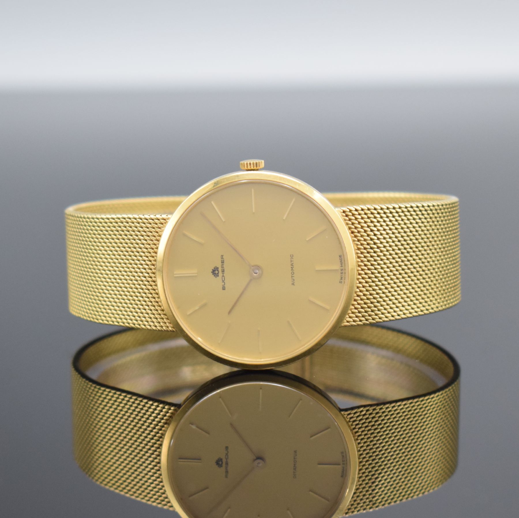 CHOPARD / BUCHERER Herrenarmbanduhr in GG 750/000 Referenz 1022, Schweiz um 1980, Automatik, 2-teil. Geh., Boden aufgedr., GG 750/000 Milanaiseband, ...
