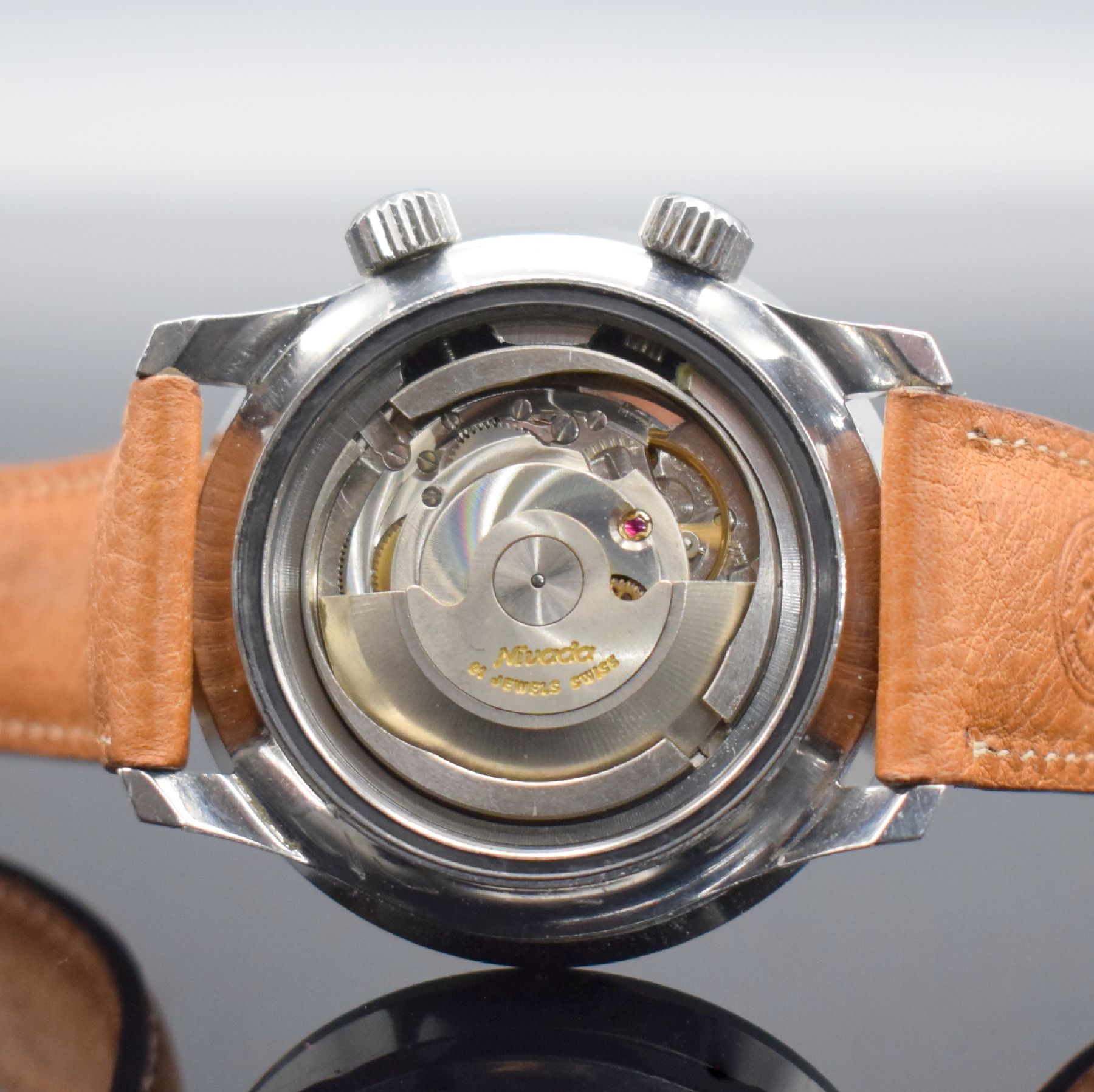 Detail d: NIVADA Grenchen Depthomatic seltene Herrenarmbanduhr mit Tiefenmesser, Schweiz um 1966, Automatik, großes Edelstahlgeh., Boden geschr., ...