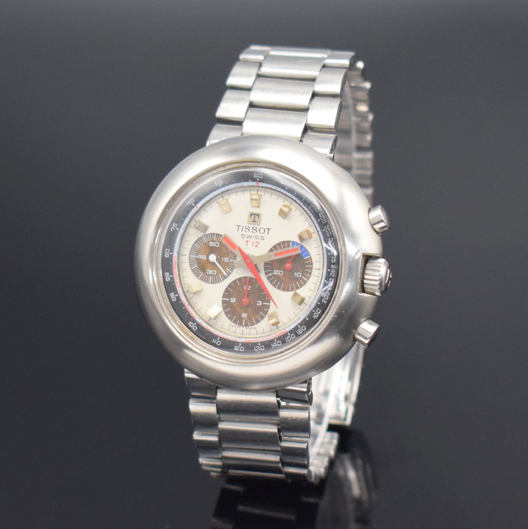 Detail b: TISSOT T12 Herrenarmbanduhr mit Chronograph, Schweiz um 1970, Handaufzug, massives Geh. in Stahl, Boden aufgedr., original Gay Freres Band m. ...