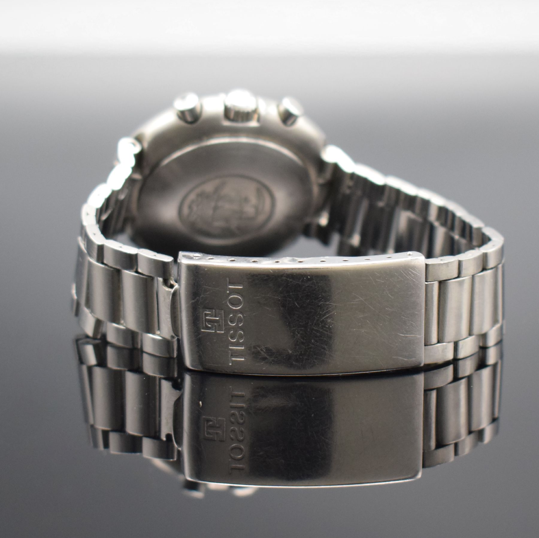 Detail d: TISSOT T12 Herrenarmbanduhr mit Chronograph, Schweiz um 1970, Handaufzug, massives Geh. in Stahl, Boden aufgedr., original Gay Freres Band m. ...