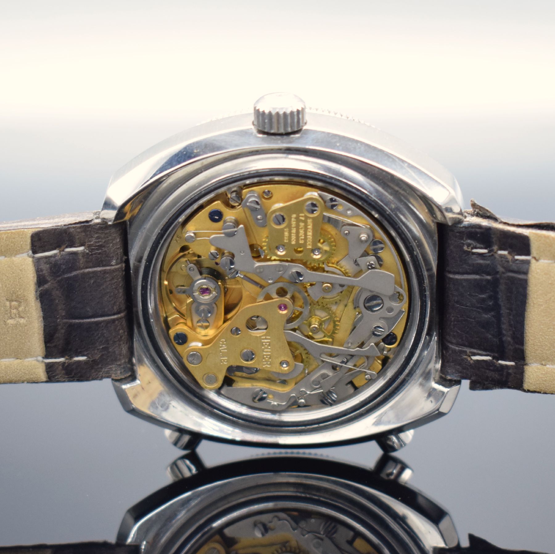Detail f: HEUER Calculator Herrenarmbanduhr mit Chronograph, Schweiz um 1975, Automatik, massives Stahlgeh., orig. Drücker & Krone, Boden geschr., silb. ...