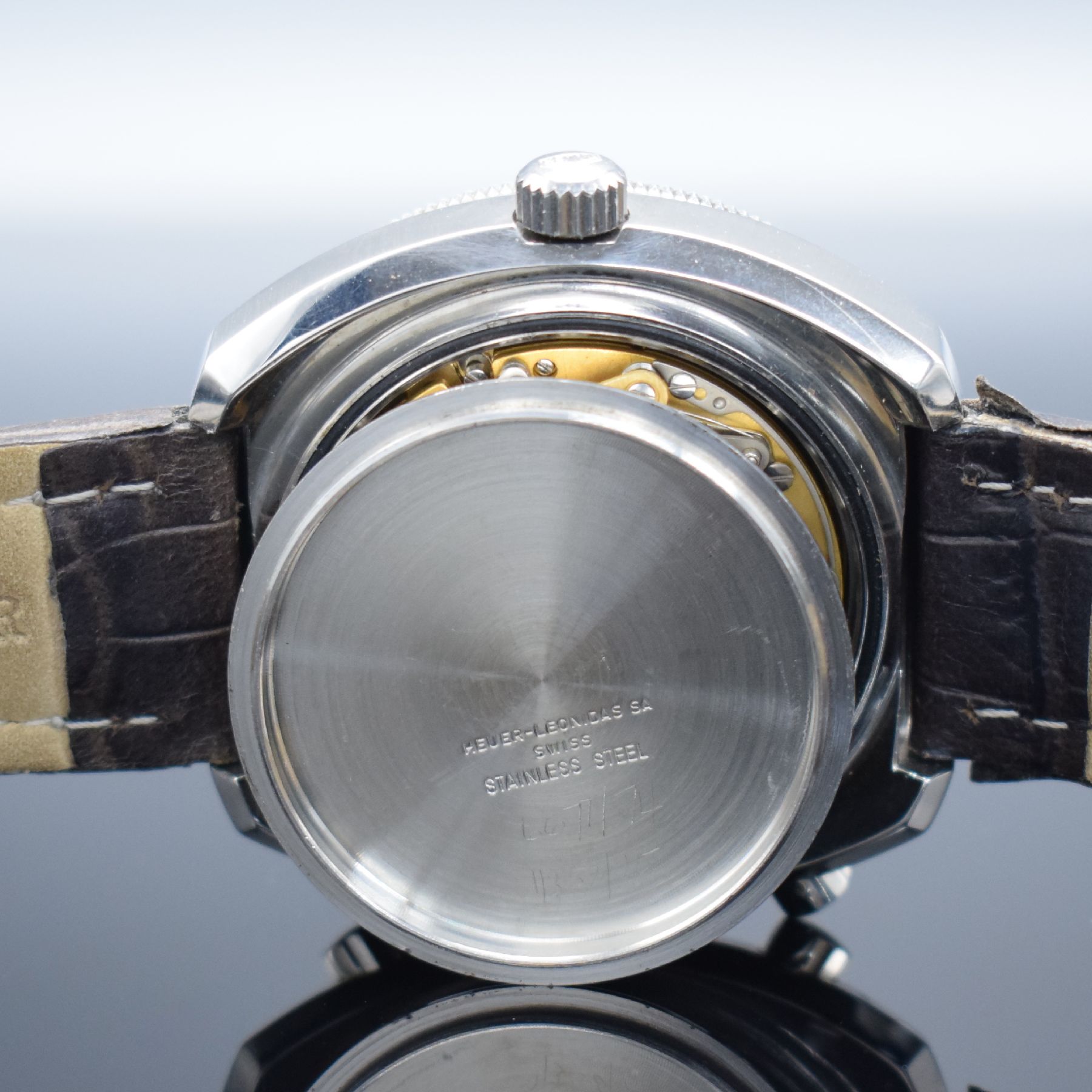 Detail g: HEUER Calculator Herrenarmbanduhr mit Chronograph, Schweiz um 1975, Automatik, massives Stahlgeh., orig. Drücker & Krone, Boden geschr., silb. ...
