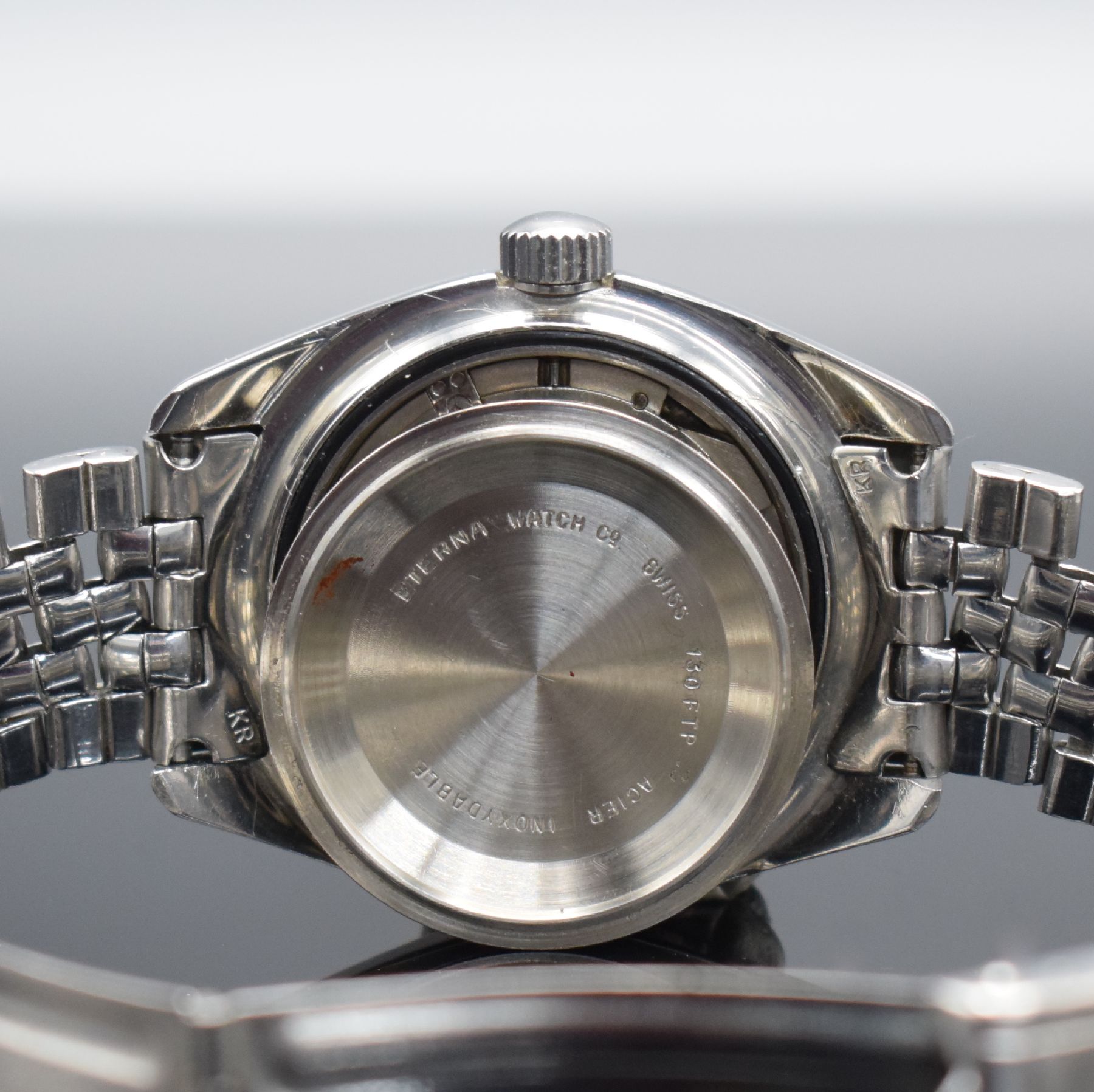 Detail e: ETERNA-MATIC Herrenarmbanduhr SUPER-KONTIKI mit Gay Freres Band in Stahl, Schweiz um 1970, Automatik, Ref. 130 FTP-3, Boden mit zentraler ...