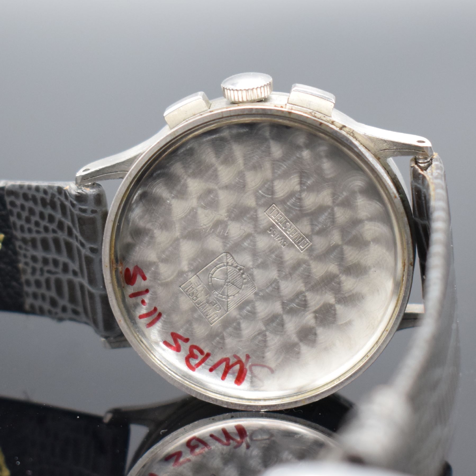 Detail g: UNIVERSAL GENEVE Tri-Compax Herrenarmbanduhr in Stahl mit Schaltradchronograph & Vollkalender Referenz 22279, Schweiz um 1945, Handaufzug, 3-teil. ...