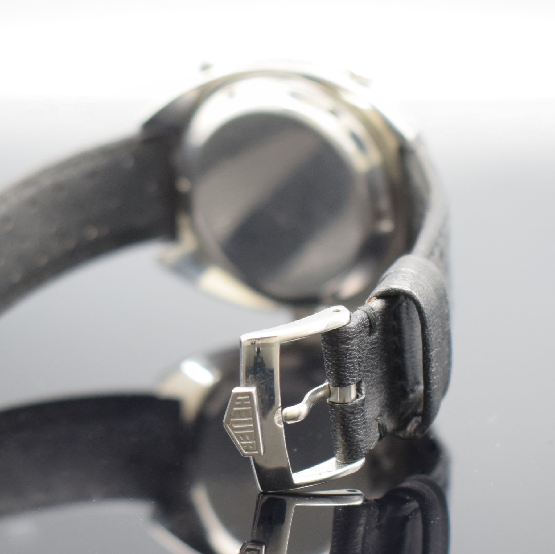 Detail b: HEUER Autavia Referenz 1163 Herrenarmbanduhr mit Chronograph, Schweiz um 1970, Automatik, massives Geh. in Stahl, Boden geschr., beids. drehb. ...