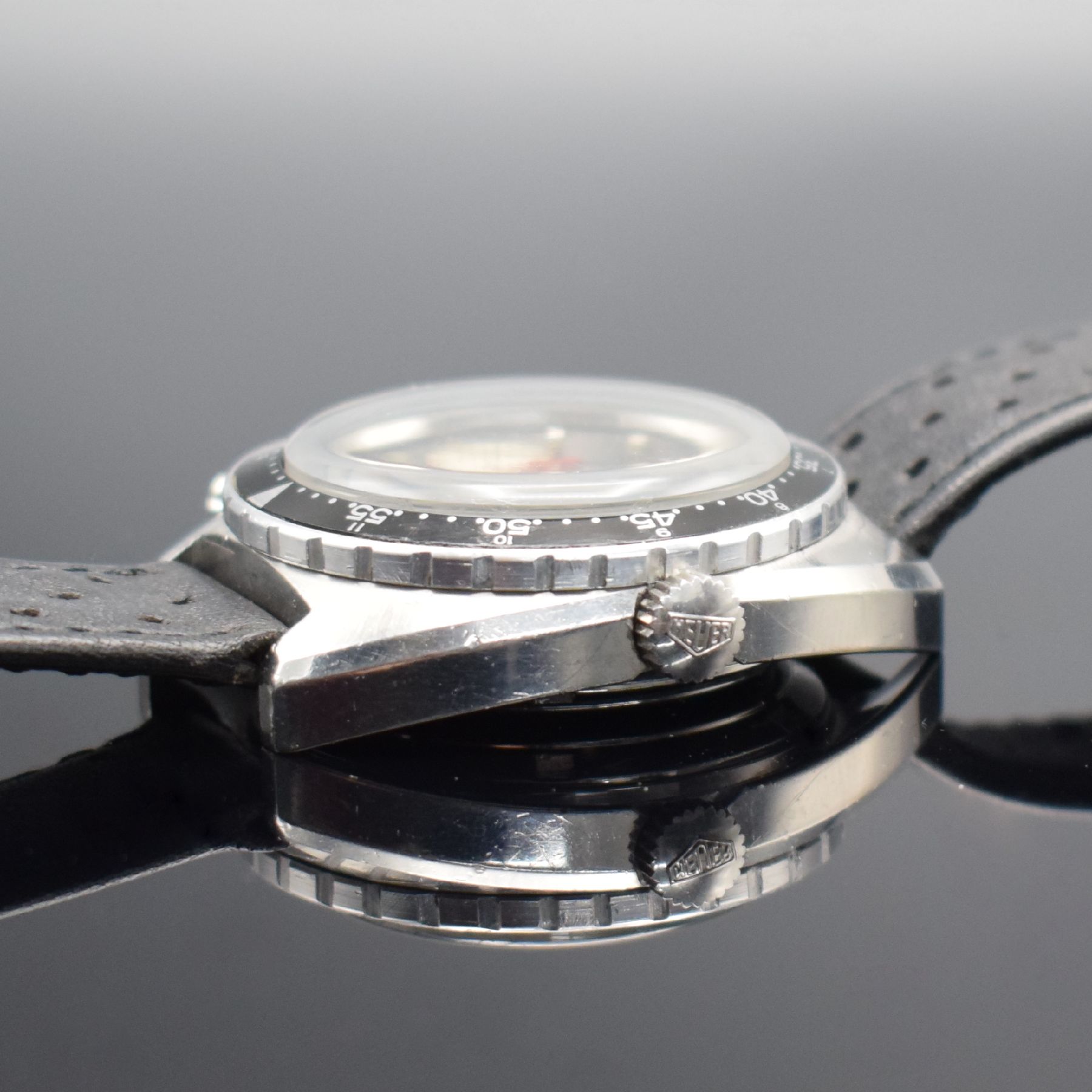 Detail c: HEUER Autavia Referenz 1163 Herrenarmbanduhr mit Chronograph, Schweiz um 1970, Automatik, massives Geh. in Stahl, Boden geschr., beids. drehb. ...