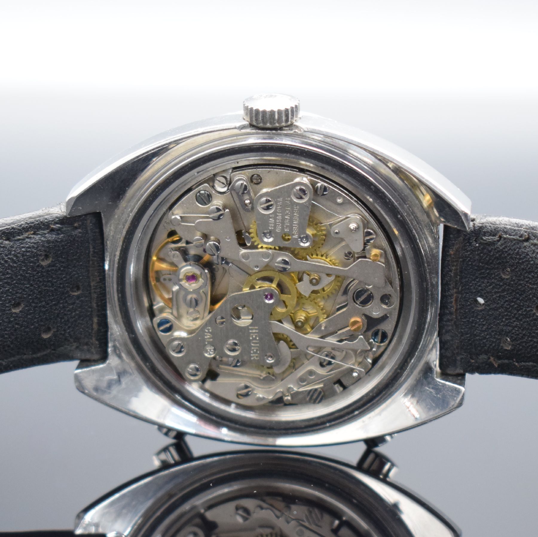 Detail e: HEUER Autavia Referenz 1163 Herrenarmbanduhr mit Chronograph, Schweiz um 1970, Automatik, massives Geh. in Stahl, Boden geschr., beids. drehb. ...