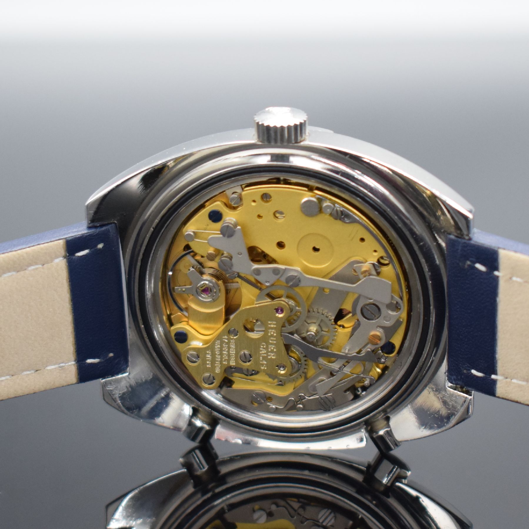 Detail d: HEUER Skipper Herrenarmbanduhr mit Chronograph, Schweiz um 1975, Automatik, Ref. 11063 V, massives Gehäuse in Stahl ohne Geh.-Nr., Boden geschr., ...