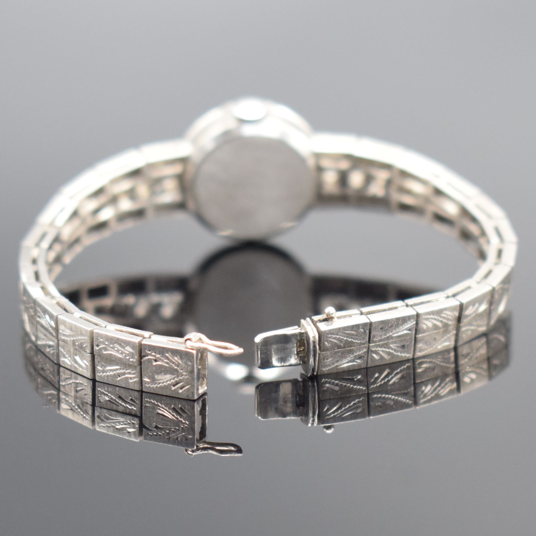 Detail b: ERBE Damengoldbanduhr in WG 750/000 mit Diamantbesatz, Schweiz um 1960, Handaufzug, WG 750/000 Band, Boden aufgedr., silb. Zifferbl. m. silb. Ind. & ...
