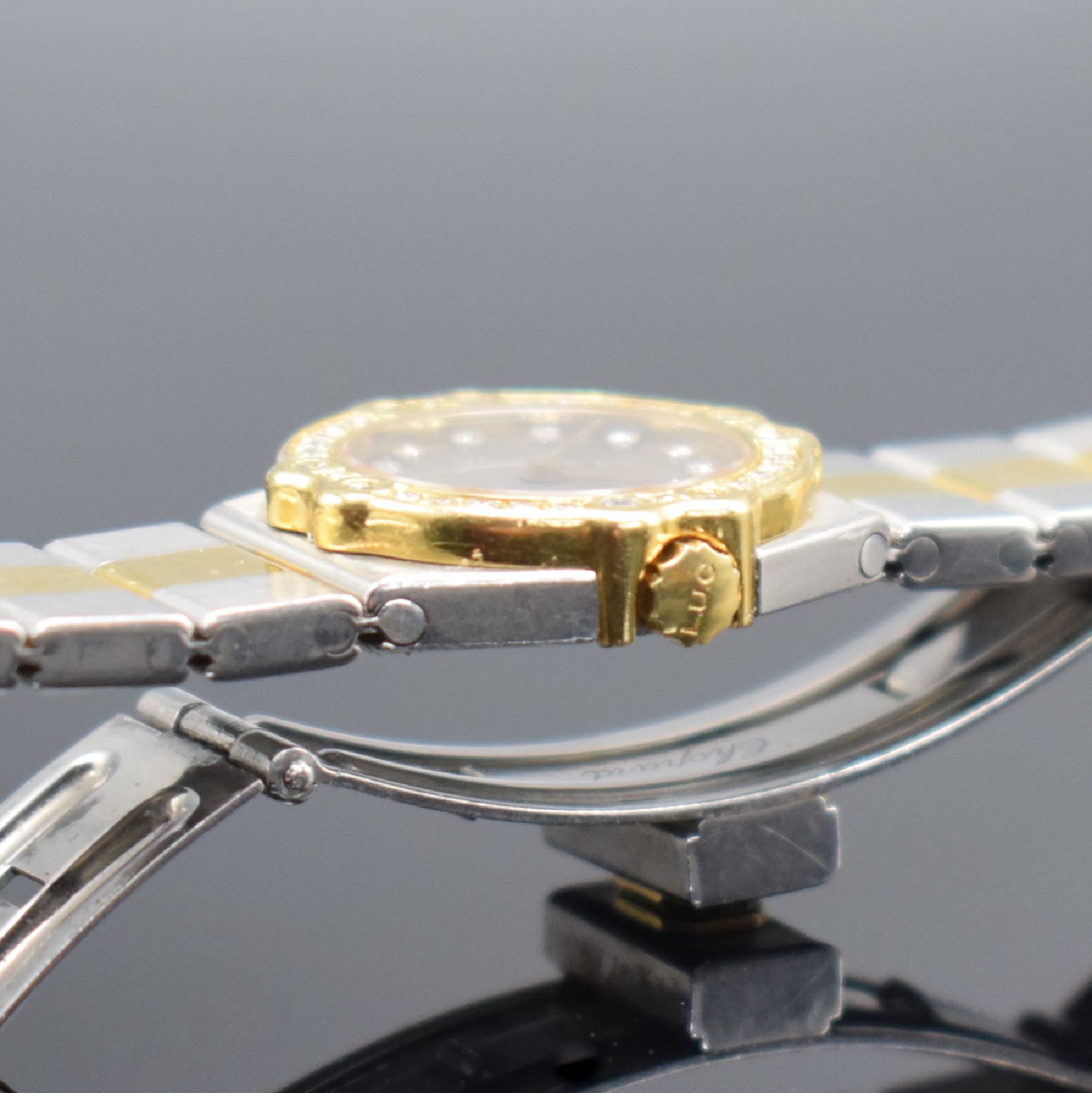 Detail e: CHOPARD Damenarmbanduhr Modell St. Moritz in Stahl/Gold, quarz, Ref. 8067, Lünette gegen Geh. 8-fach verschr., orig. Gliederband m. dopp. Faltschl., ...
