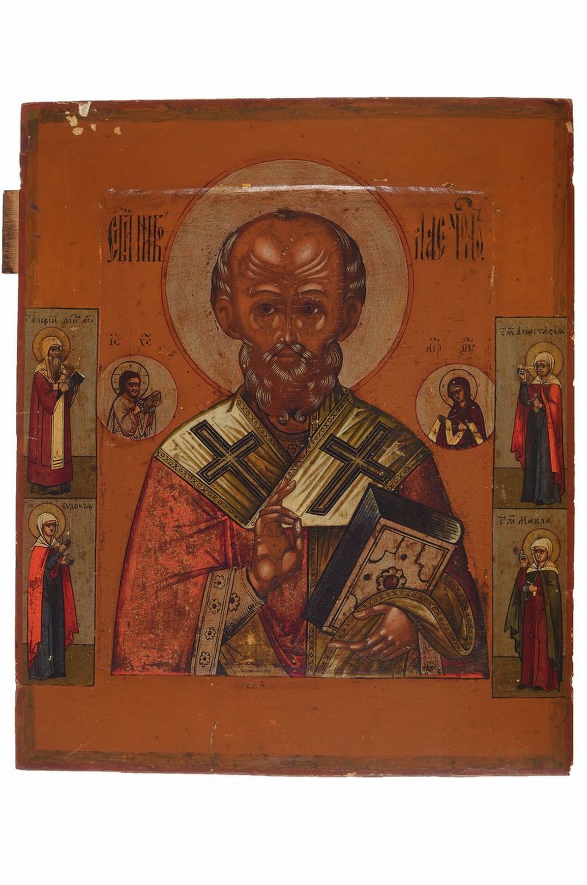 Ikone, Russland, um 1900, Hl. Nikolaus, Tempera auf Holz, vertieftes Mittelfeld, vier Randheilige, ca. 31x25cm, leichtere Oberflächenschäden