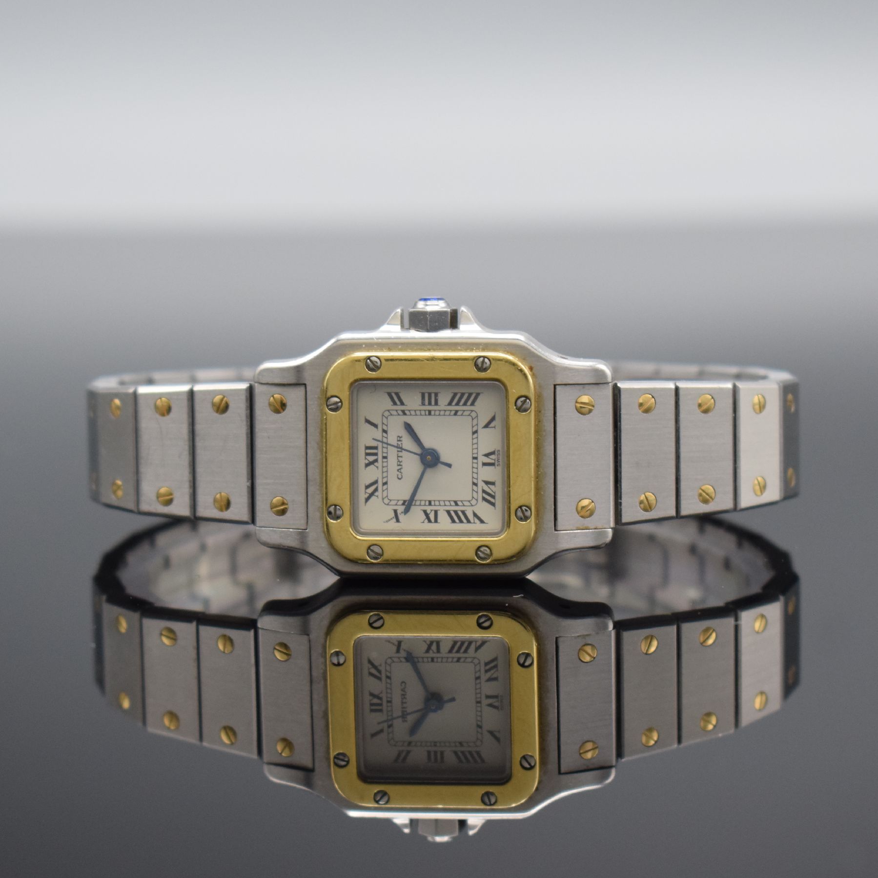 CARTIER Santos Damenarmbanduhr in Stahl/Gold, Schweiz um 1990, Automatik, Ref. 1170902, Boden & Lünette 8-fach verschr., Gliederband m. dopp. ...