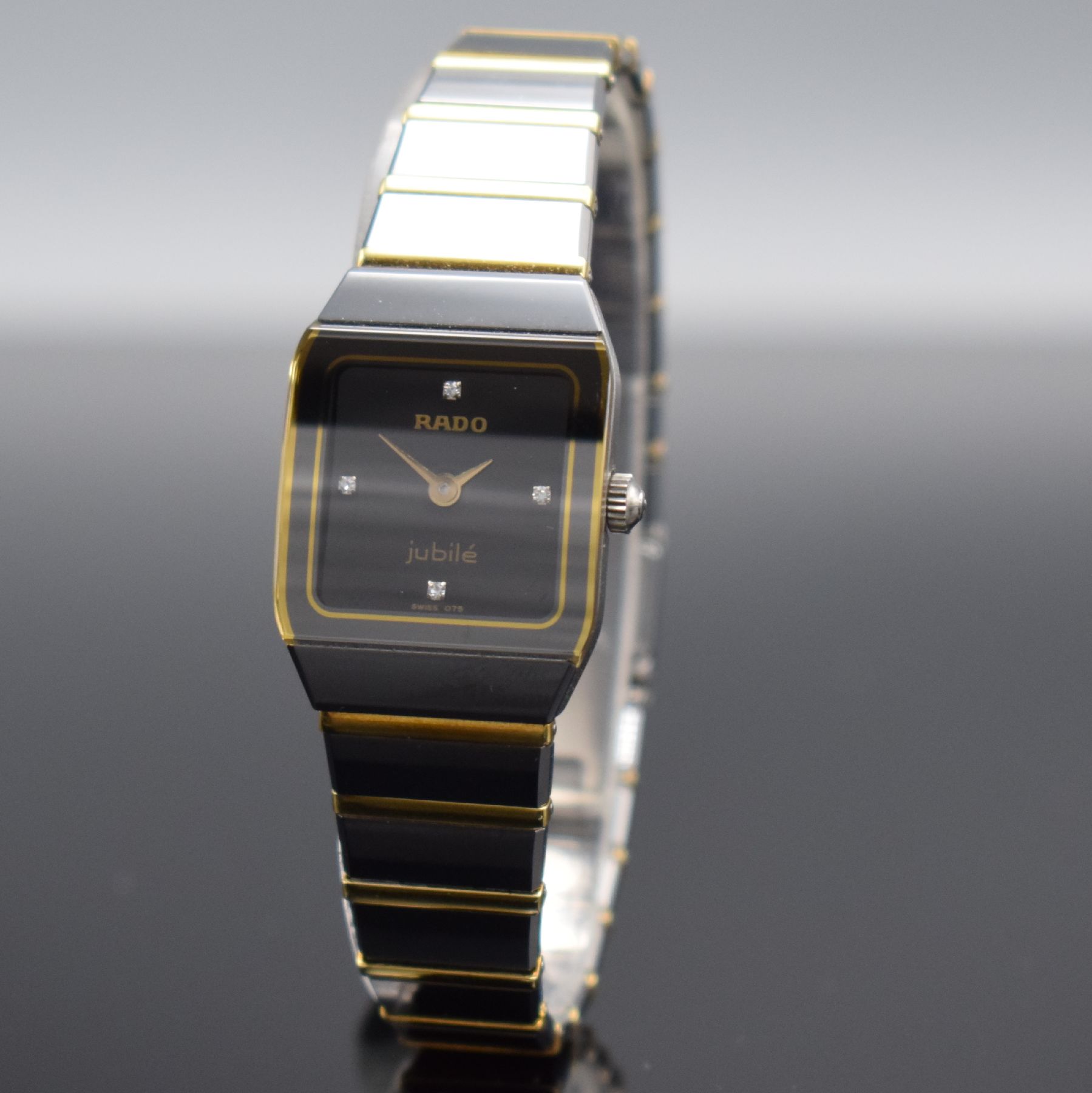 Detail a: RADO Jubilé Damenarmbanduhr mit 4 Diamantindizes, Schweiz um 1996, quarz, Ref. 204.0268.3, Stahlgeh. m. integr. Keramik/Gold-Band m. Faltschl., ...