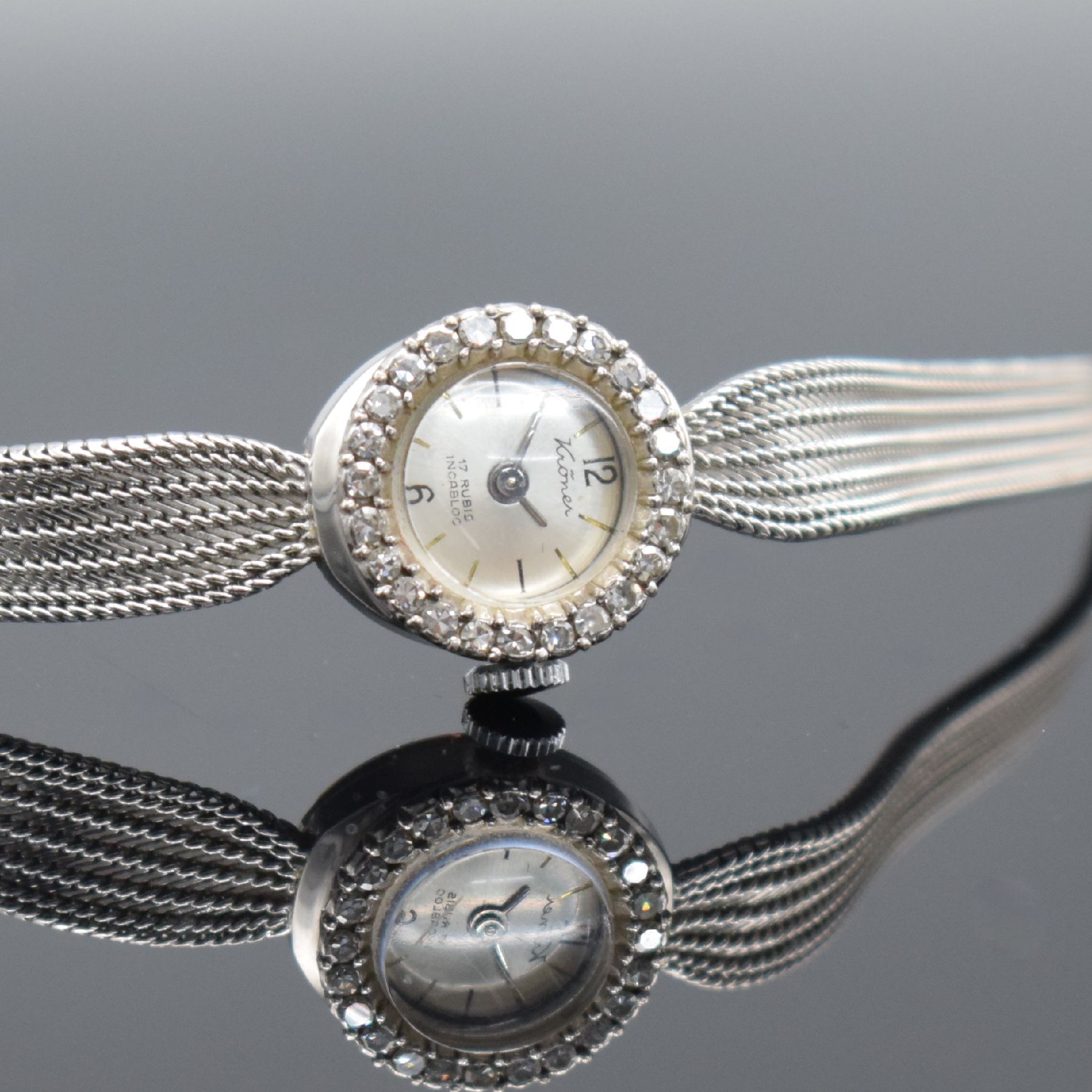 Detail b: KRÖNER Damenarmbanduhr in WG 585/000, um 1960, Handaufzug, 2-teil. Geh., Boden aufgedr., WG 585/000 Milanaiseband, Lünette mit Diamanten bes., ...