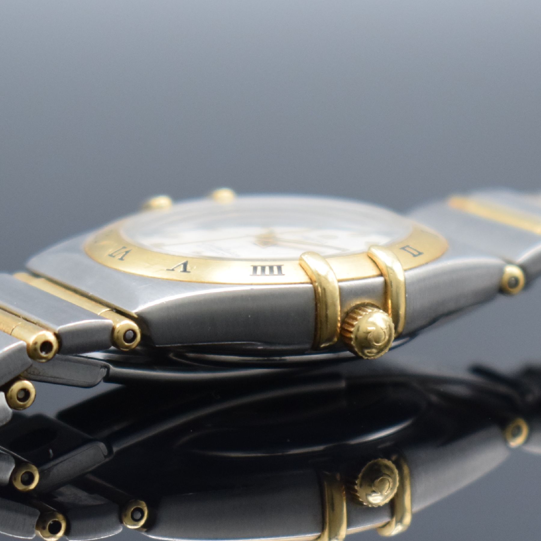 Detail c: OMEGA Constellation Damenarmbanduhr in Stahl/Gold, Schweiz um 2000, Automatik, Ref. 766 1201, Boden aufgedr., Gliederband m. Faltschl., Lünette m. ...