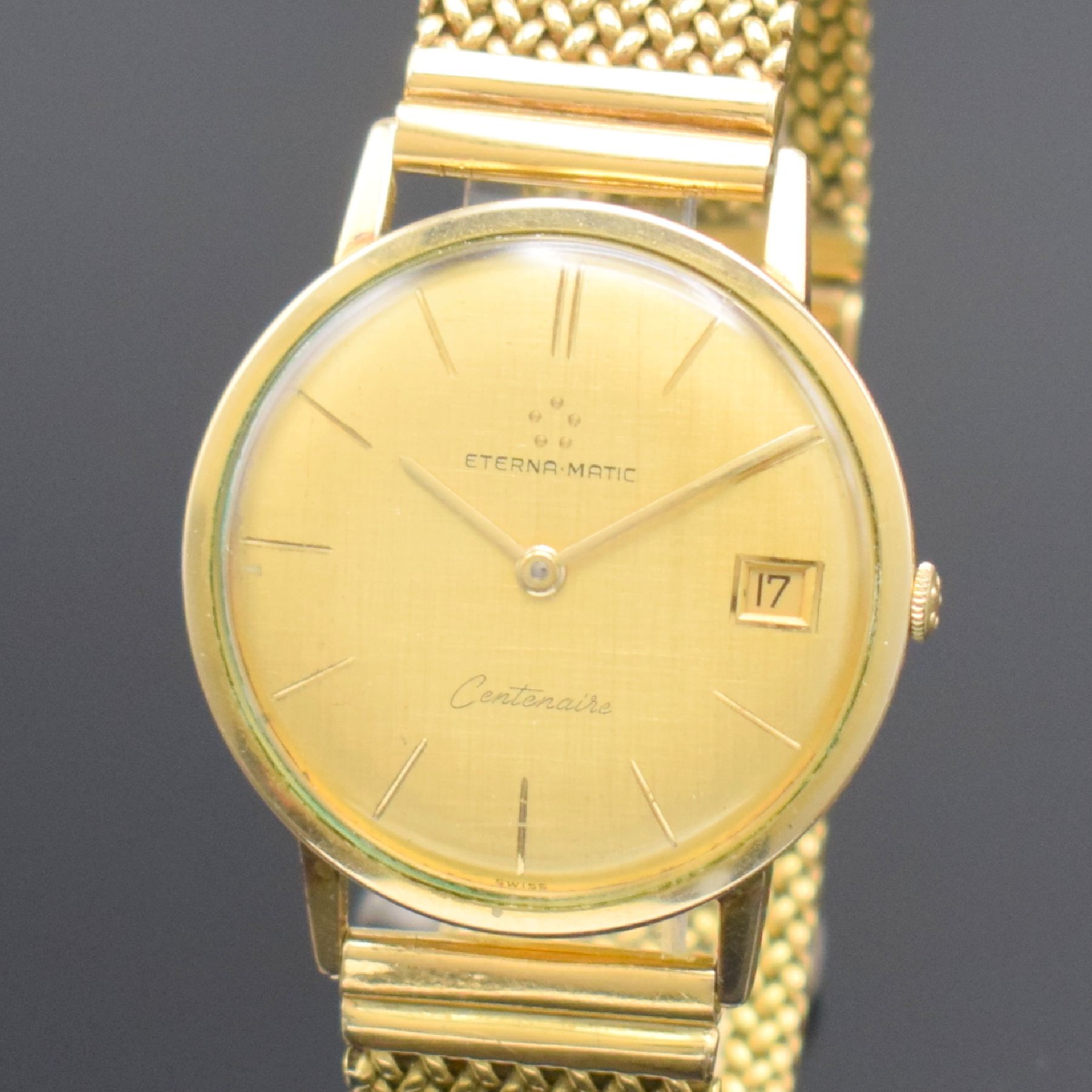 Detail a: ETERNA-MATIC Centenaire vergoldete Herrenarmbanduhr mit neutralem GG 750/000 Band, Schweiz um 1960, Automatik, 3-teil. Geh., Boden & Glasrand ...