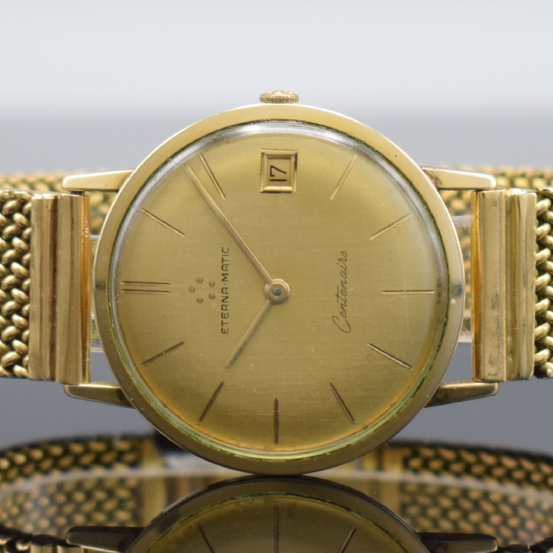 Detail b: ETERNA-MATIC Centenaire vergoldete Herrenarmbanduhr mit neutralem GG 750/000 Band, Schweiz um 1960, Automatik, 3-teil. Geh., Boden & Glasrand ...