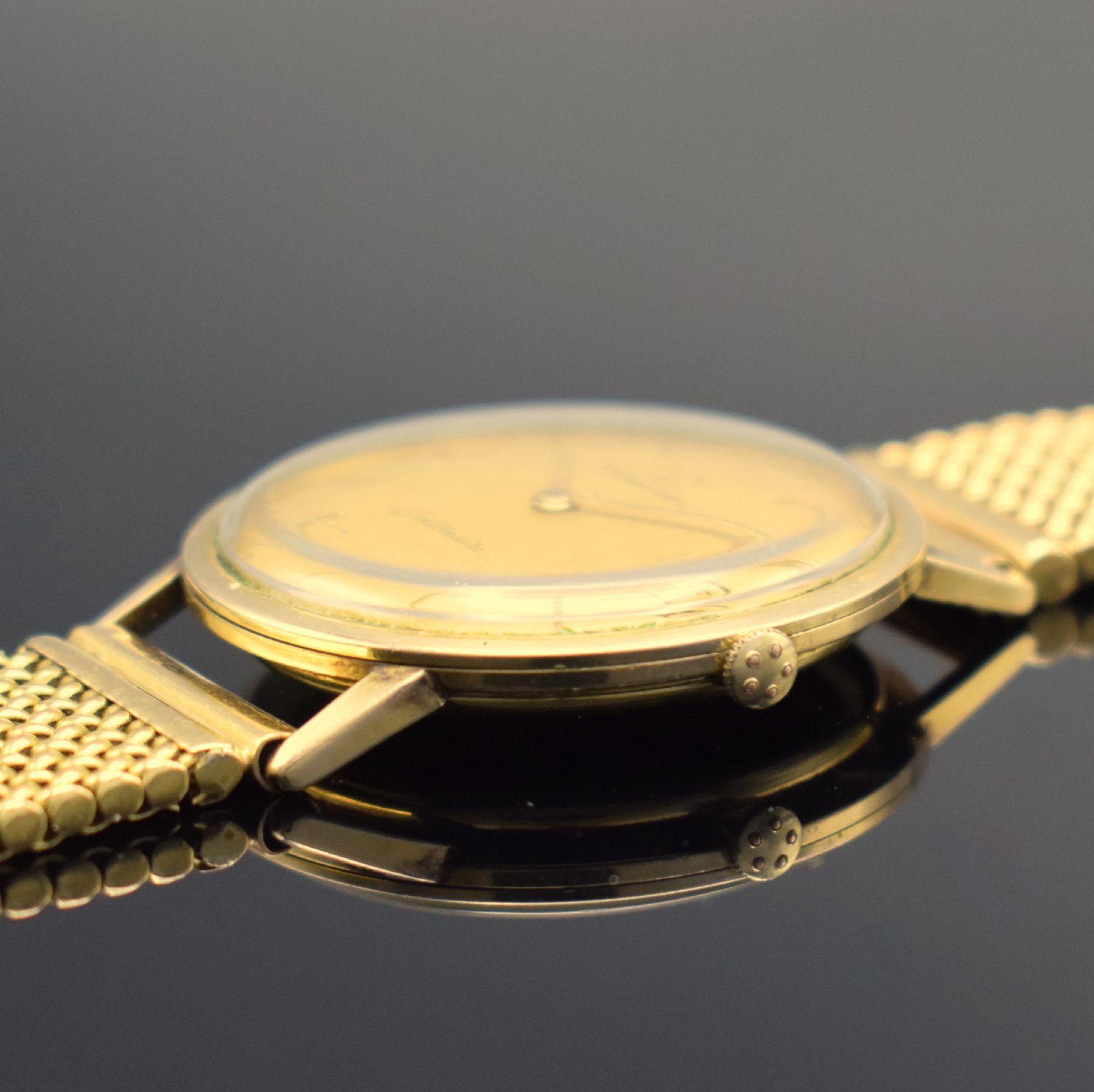 Detail d: ETERNA-MATIC Centenaire vergoldete Herrenarmbanduhr mit neutralem GG 750/000 Band, Schweiz um 1960, Automatik, 3-teil. Geh., Boden & Glasrand ...