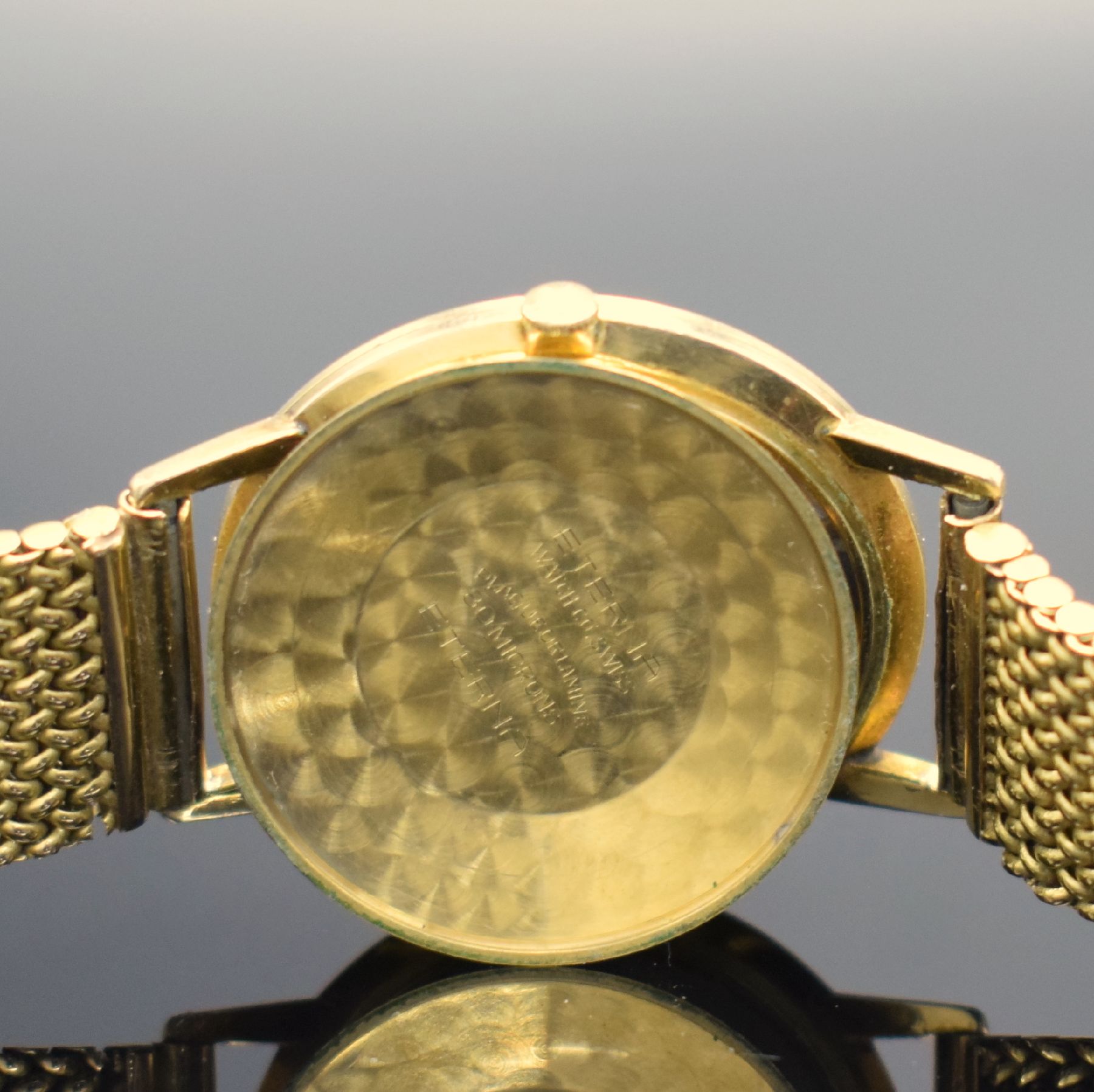 Detail f: ETERNA-MATIC Centenaire vergoldete Herrenarmbanduhr mit neutralem GG 750/000 Band, Schweiz um 1960, Automatik, 3-teil. Geh., Boden & Glasrand ...