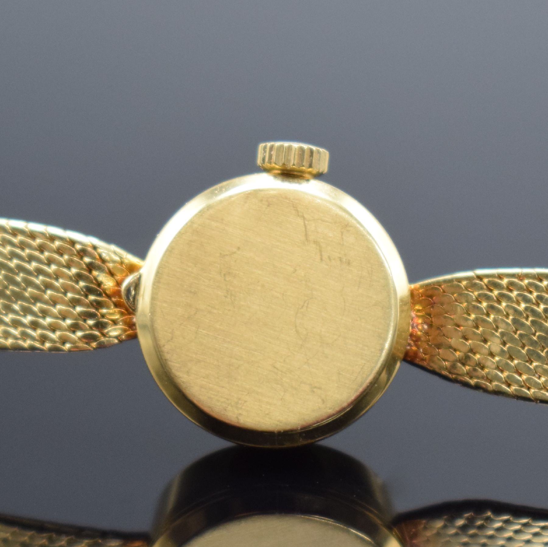 Detail c: CHOPARD Damenarmbanduhr in GG 750/000, Schweiz um 1965, Handaufzug, Geh. an GG 750/000 Band, aufgedr. Boden dell., silb. Zifferbl. m. gold. Std.-Ind. ...
