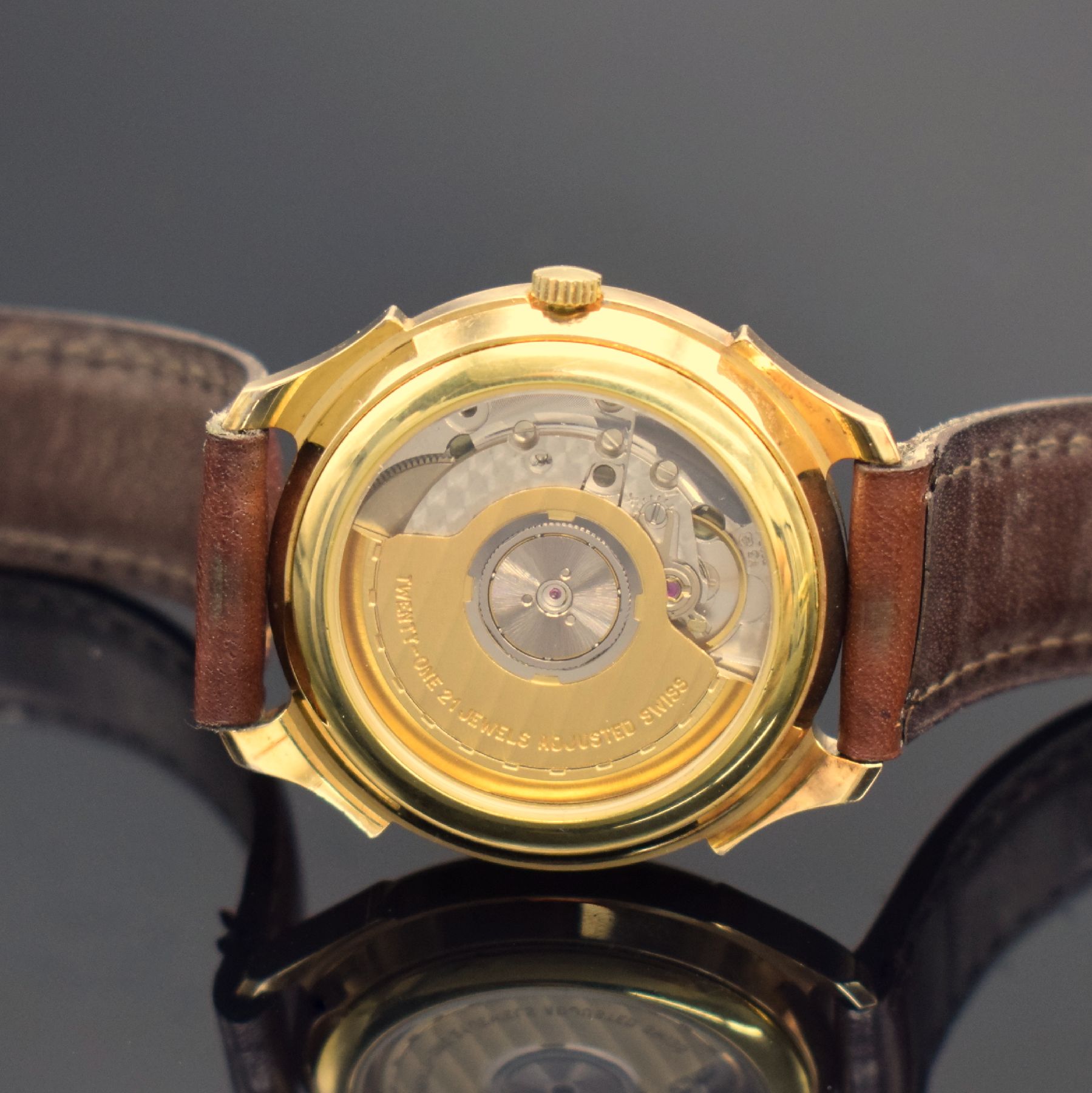 Detail c: GUB Glashütte/SA Herrenarmbanduhr, Deutschland, Automatik, beids. vergl., verg. Geh., Boden aufgedr., weißes Zifferbl. m. arab. Zahlen, gold. ...