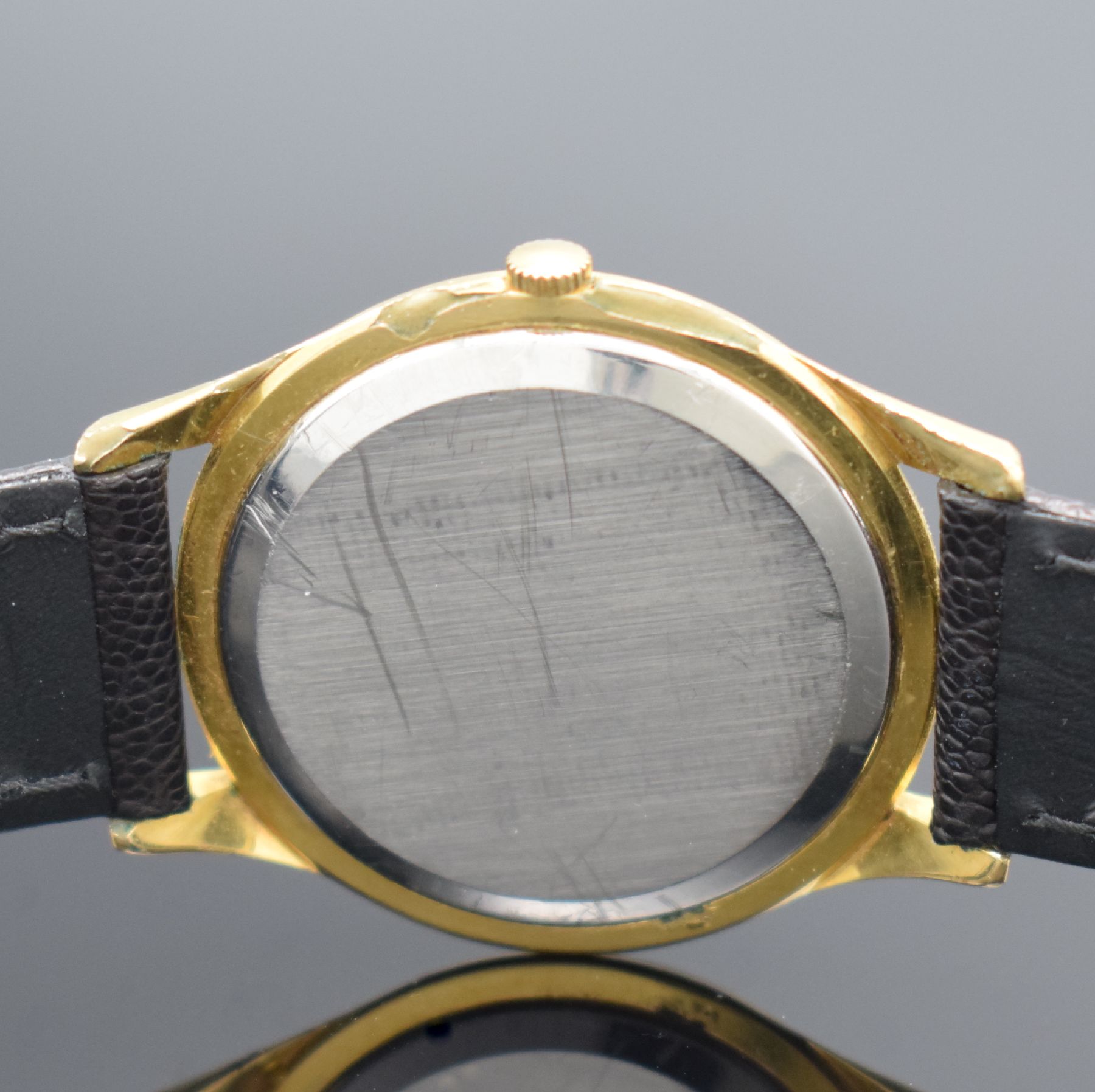 Detail d: OMEGA Herrenarmbanduhr Ref. 132.003, Schweiz um 1965, Handaufzug, verg. Geh., Stahlboden aufgedr., silb. Zifferbl. m. aufges. Std.-Ind.rest., gold. ...
