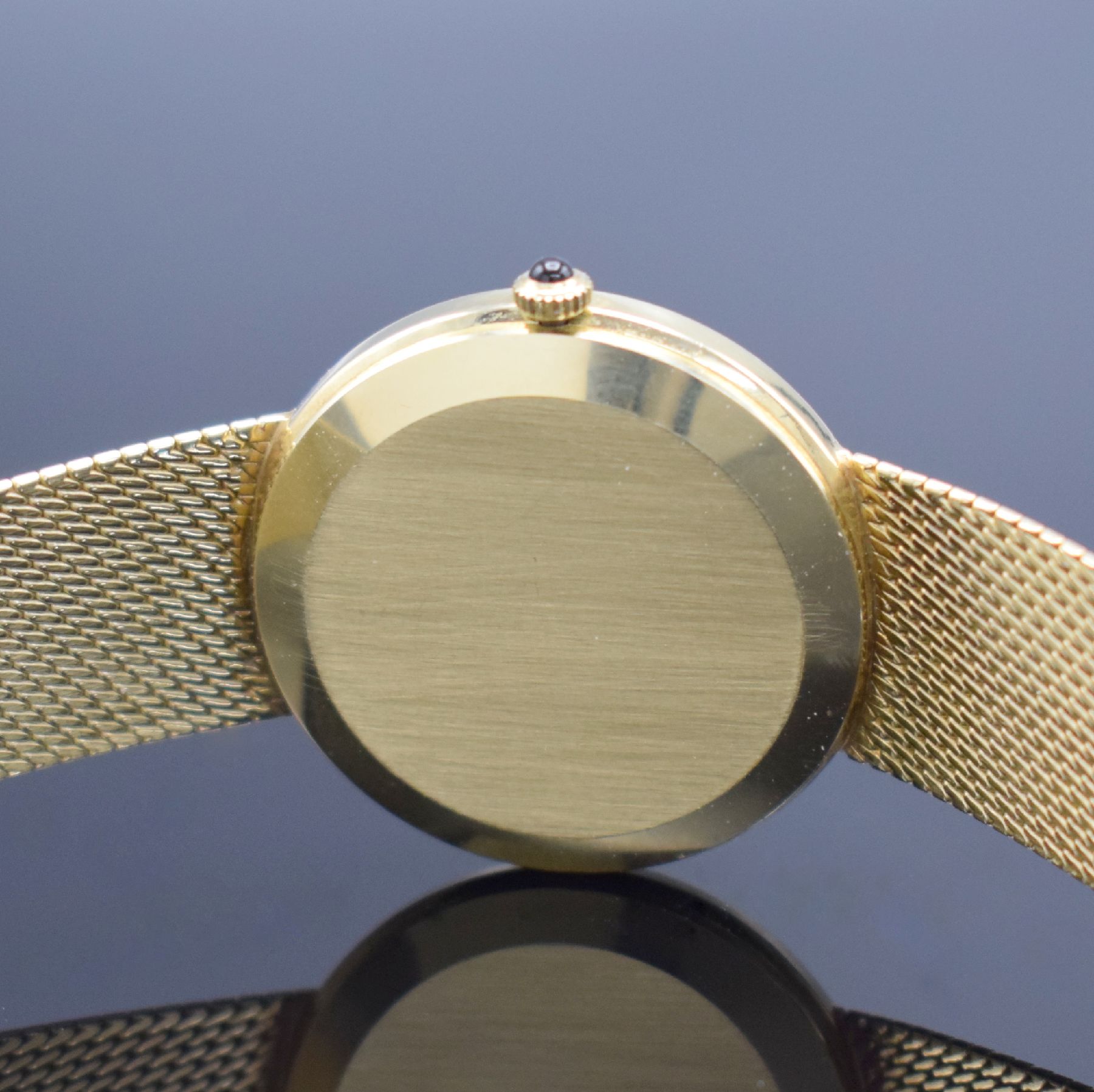 Detail d: OMEGA De Ville Herrenarmbanduhr in GG 585/000, Schweiz um 1973, Handaufzug, Boden aufgedr., Geh. an neutr. Goldband (später auf Kundenwunsch) in GG ...