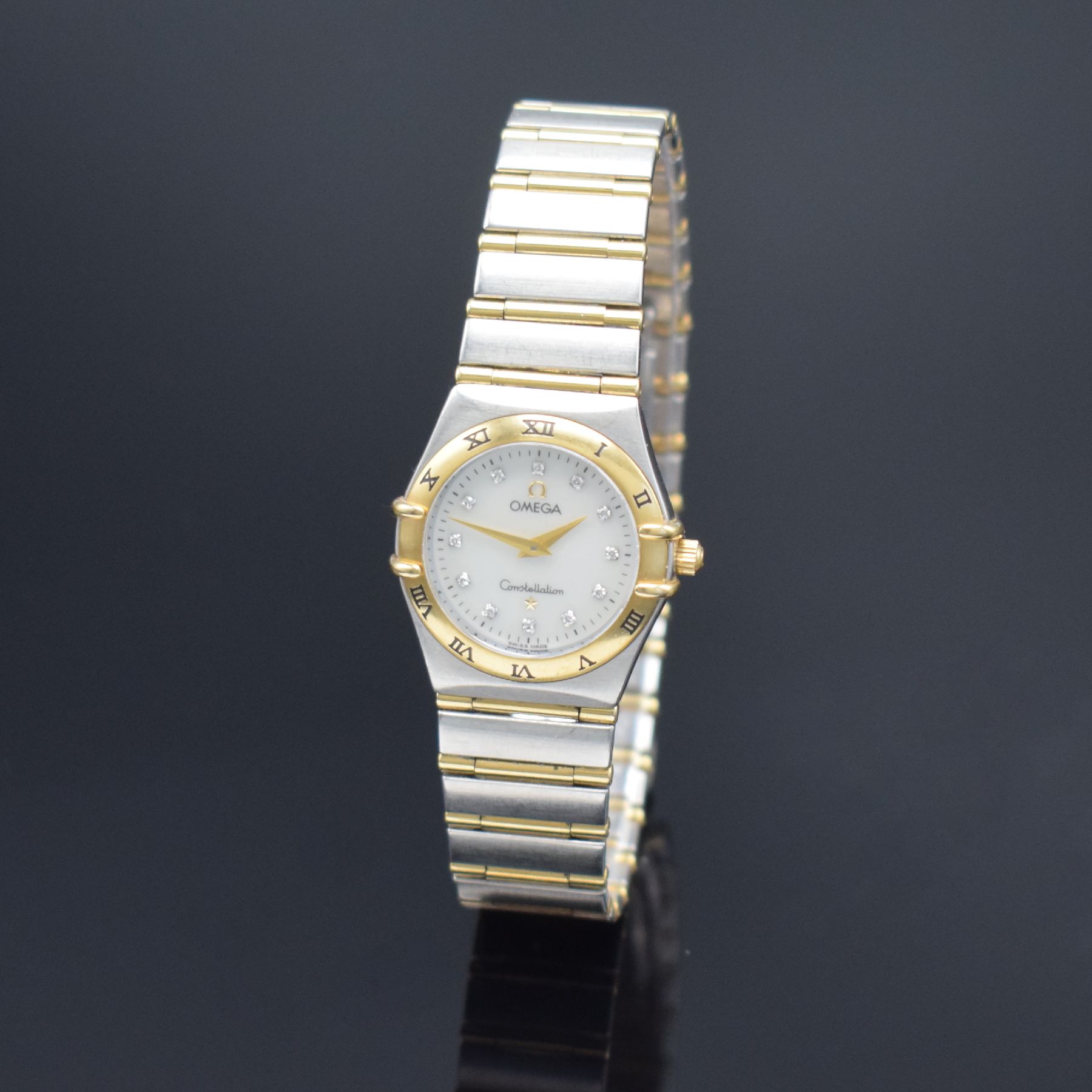 OMEGA Constellation Damenarmbanduhr, Schweiz verk. lt. beil. Pap. 08/2004, quarz, Ref. 12727500, Edelstahl/Gold komb., Boden gedr., Gliederband m. ...