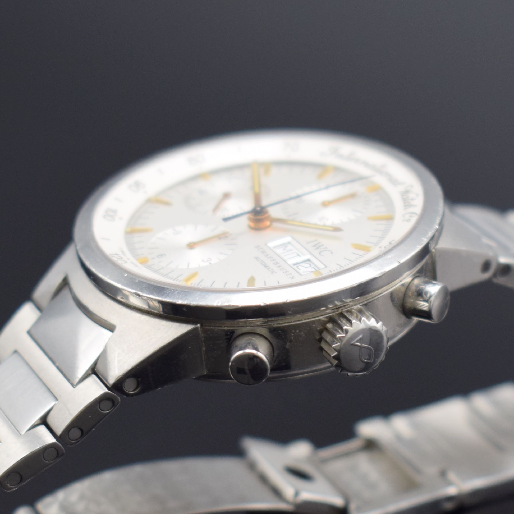 Detail c: IWC GST Armbandchronograph Referenz 3707, Schweiz um 1999, Automatik, verschr. Edelstahlgeh. inkl. orig. Gliederband m. Faltschl., silb. Zifferbl. m. ...